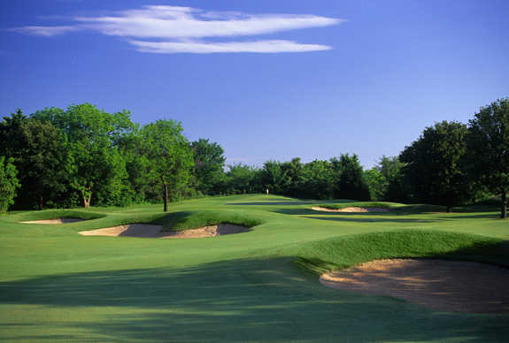 Course aerial view showing rolling fairways and bunkers
