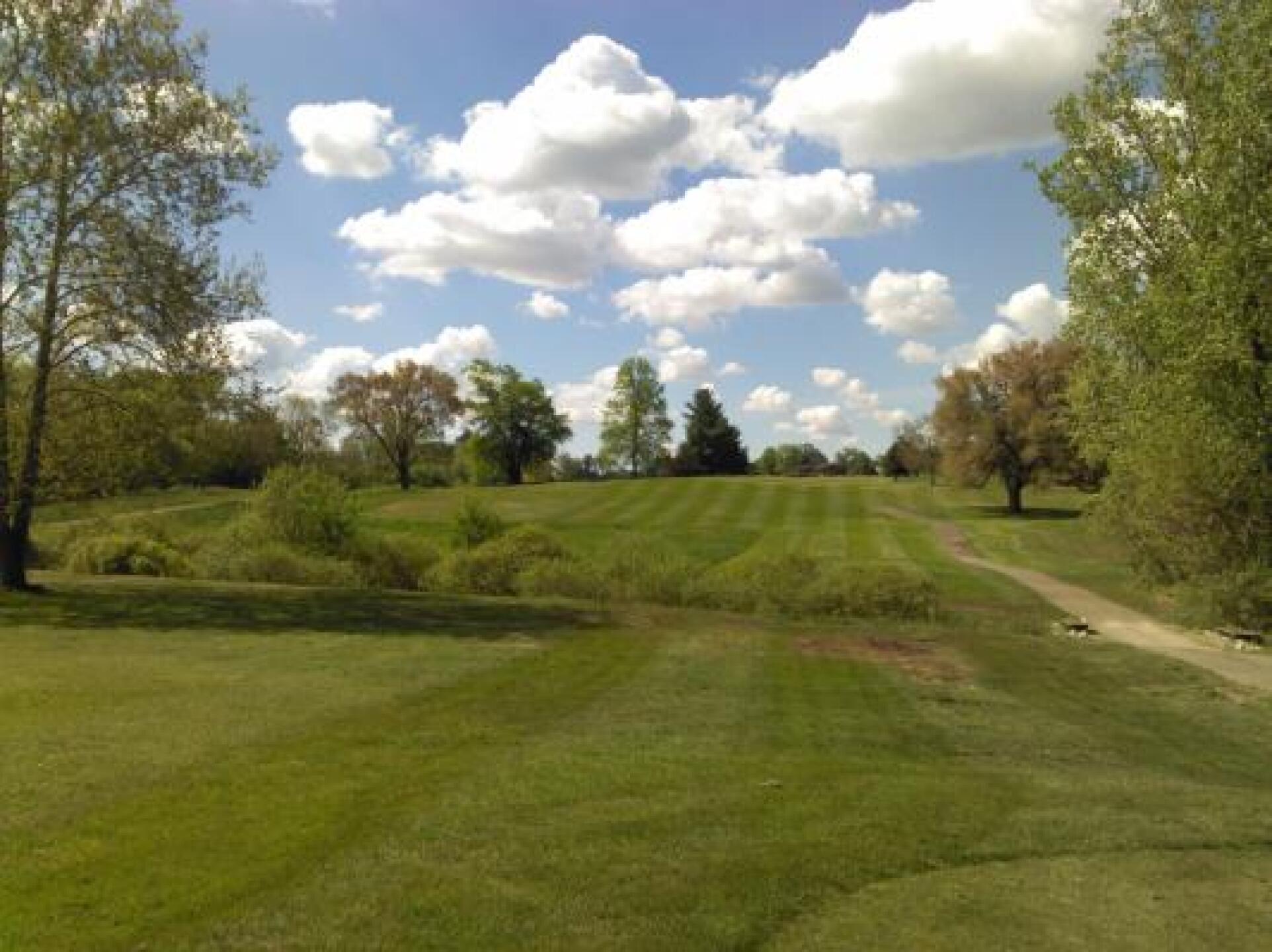 This I believe is one of the par 5's and you can see the rise in elevation and the rolling fairway. (Photo submitted by dwal64 on 05/27/2014)