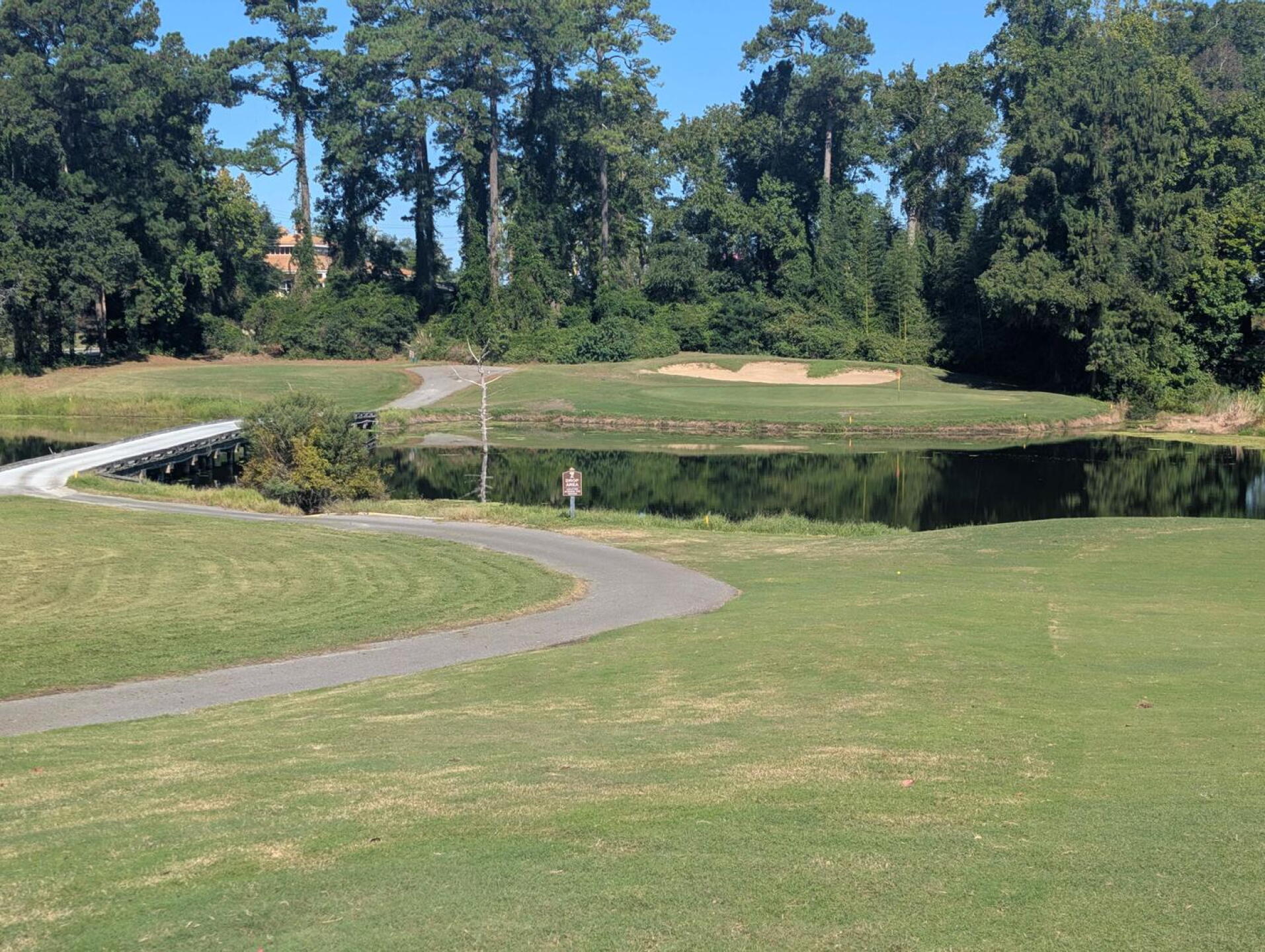Water on every par 3 and protecting several greens. (Photo submitted by Ku99czNxc9LQ8bDwWMyw on 09/30/2026)