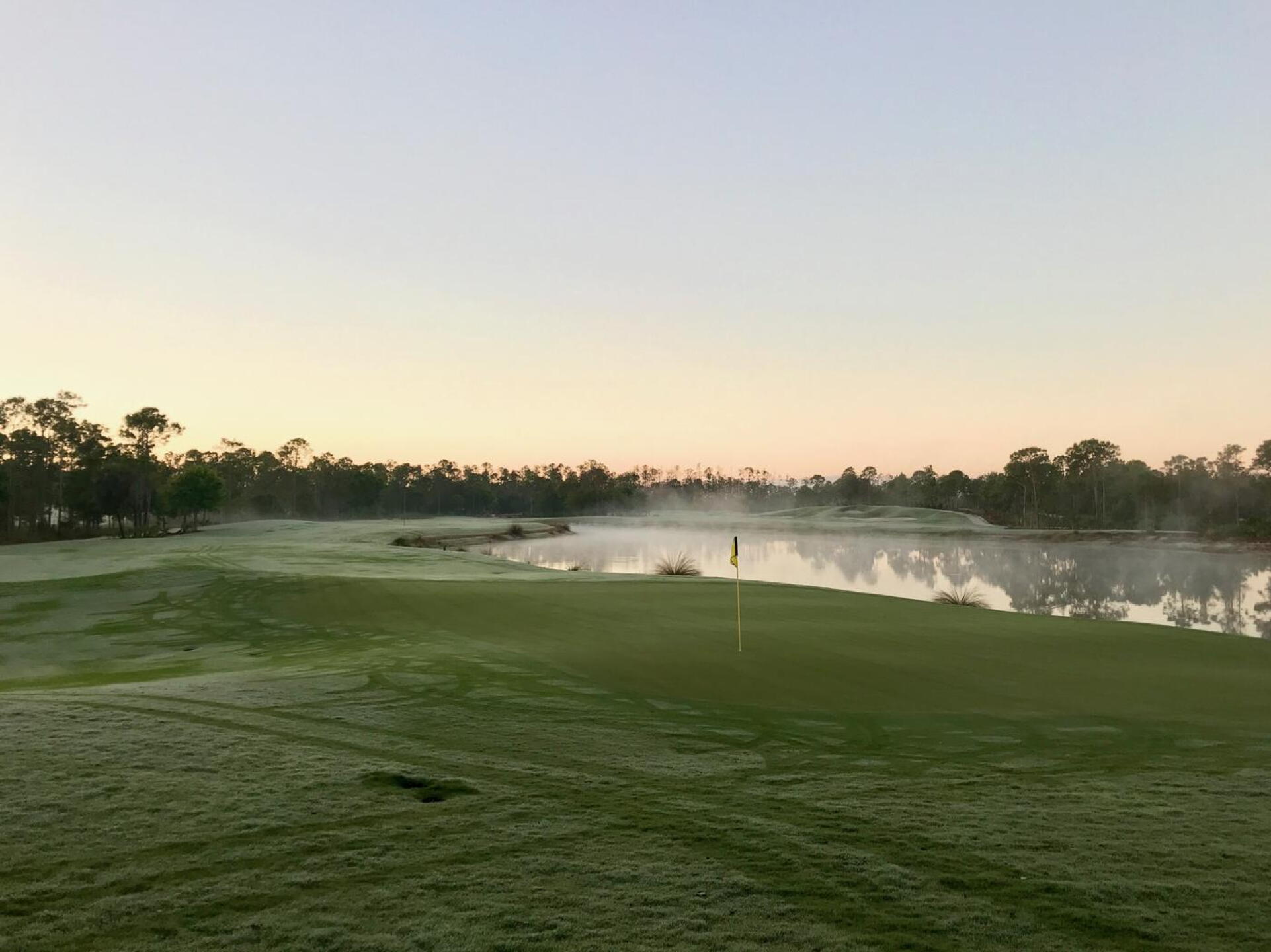 Old Corkscrew's 18th green at dawn (Photo submitted by TimGavrichGP on 02/23/2018)