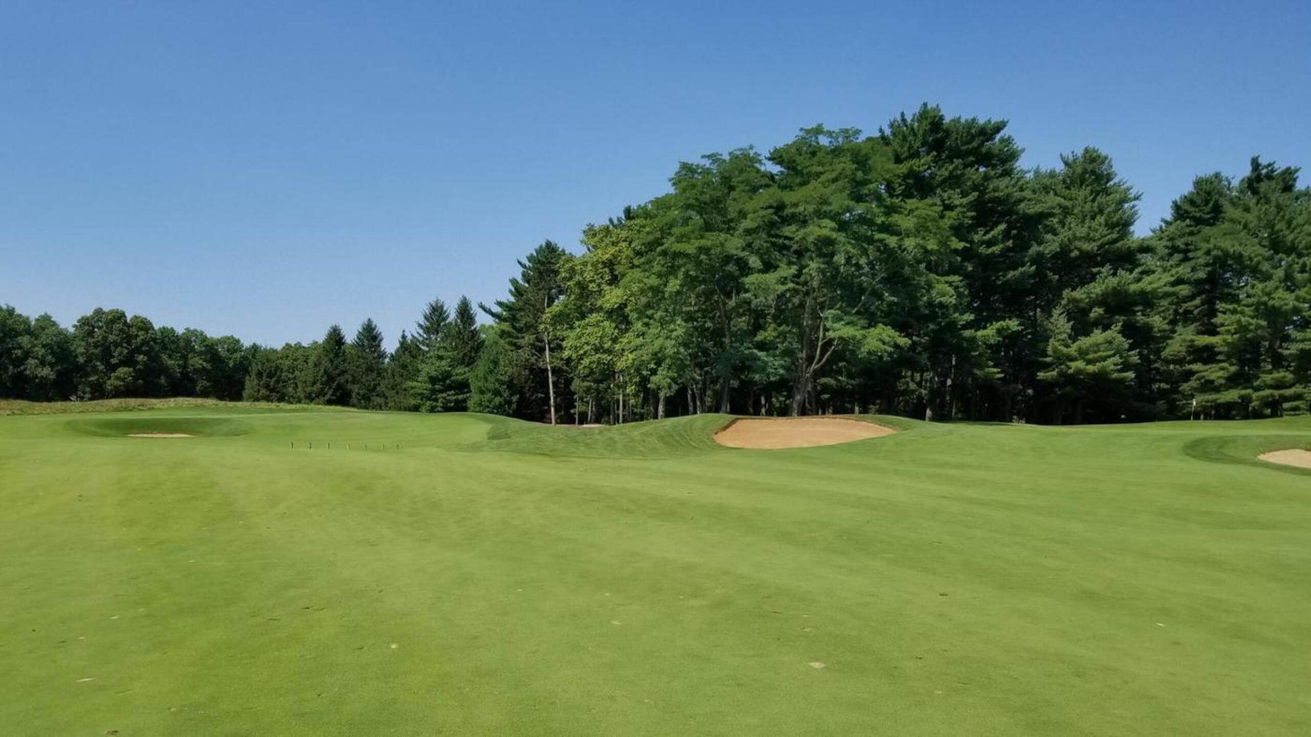 The brawny par 5 seventh, one green back left and another on right (Photo submitted by Brookscm72 on 07/30/2018)