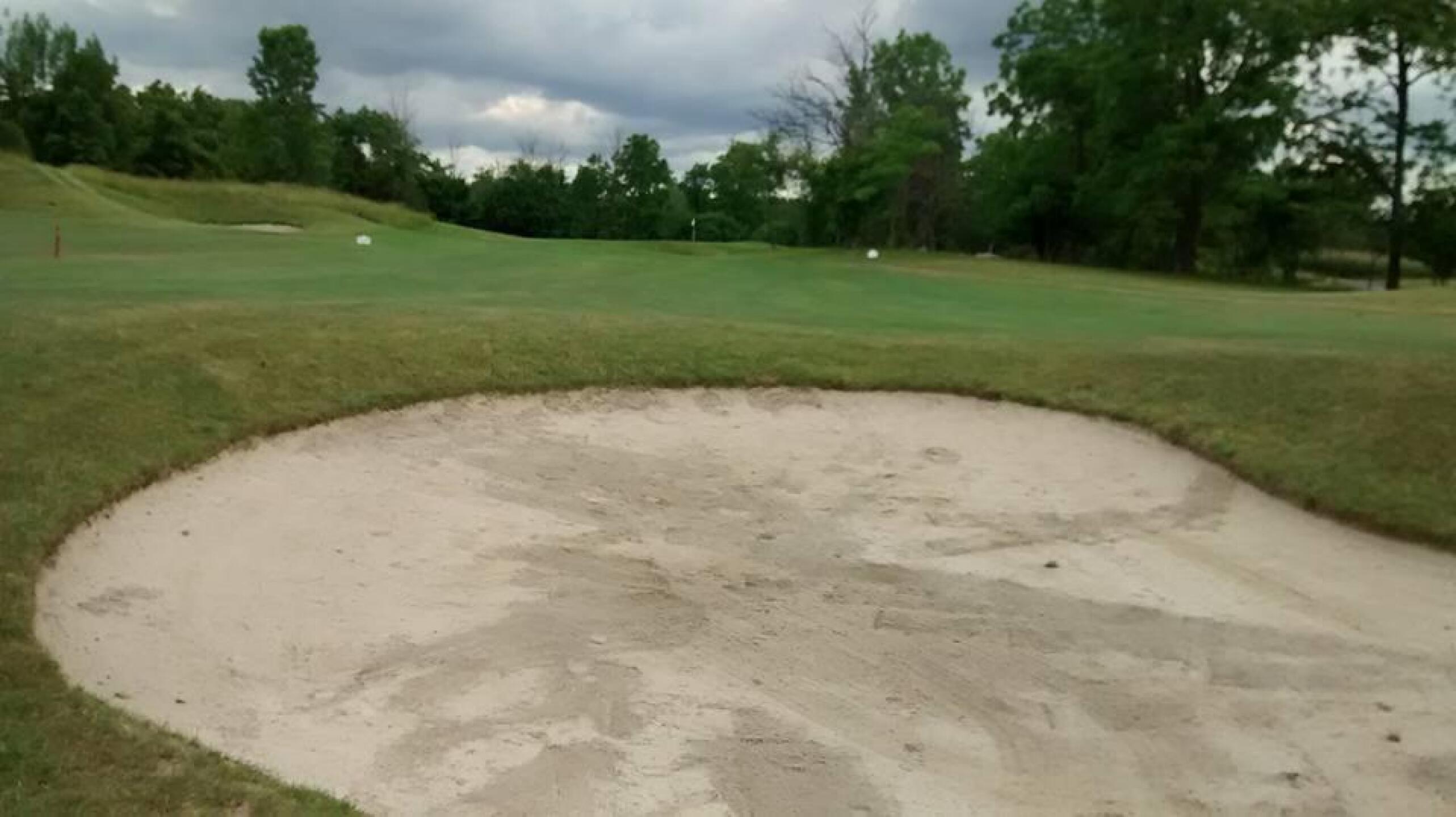 Fairway bunker. Not sand, just baked hard dirt. (Photo submitted by Ernest1975 on 06/28/2016)
