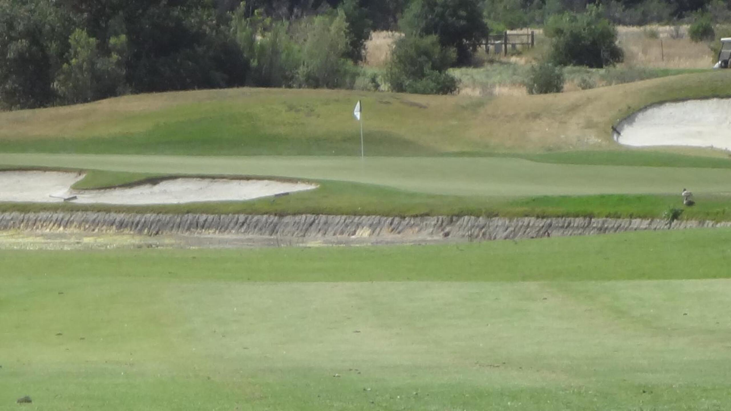9th hole; 2nd shot view over water (Photo submitted by Tom6522810 on 06/03/2015)