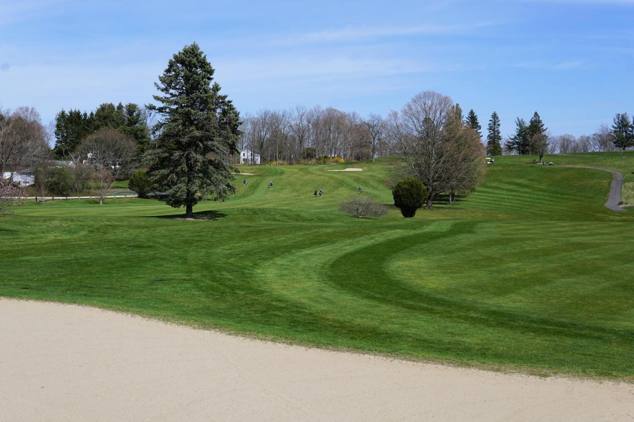 A view down the first fairway–in the distance–with the 9th hole in foreground. (Photo submitted by AptlyLinked on 04/13/2023)