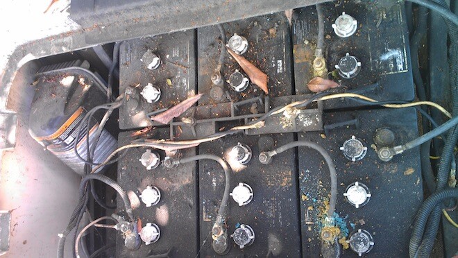 Not a pretty sight when you're a mile from the clubhouse. But before you call the clubhouse, pour some cola (if you have it) on corroded terminals.