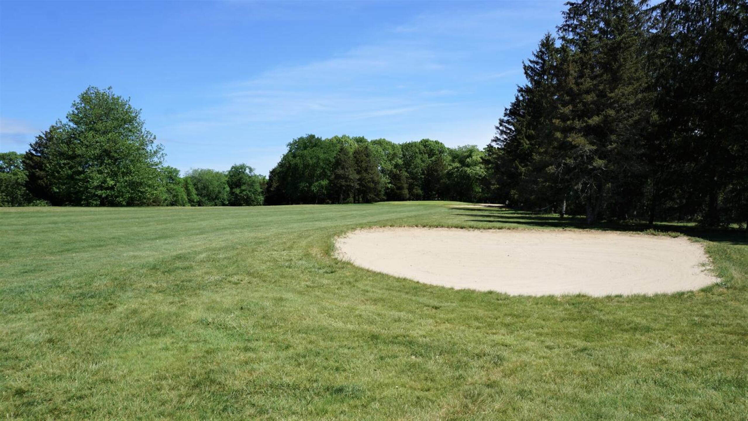 The first: a big bunker hugs the fairway’s right side in the landing zone. (Photo submitted by AptlyLinked on 05/25/2021)