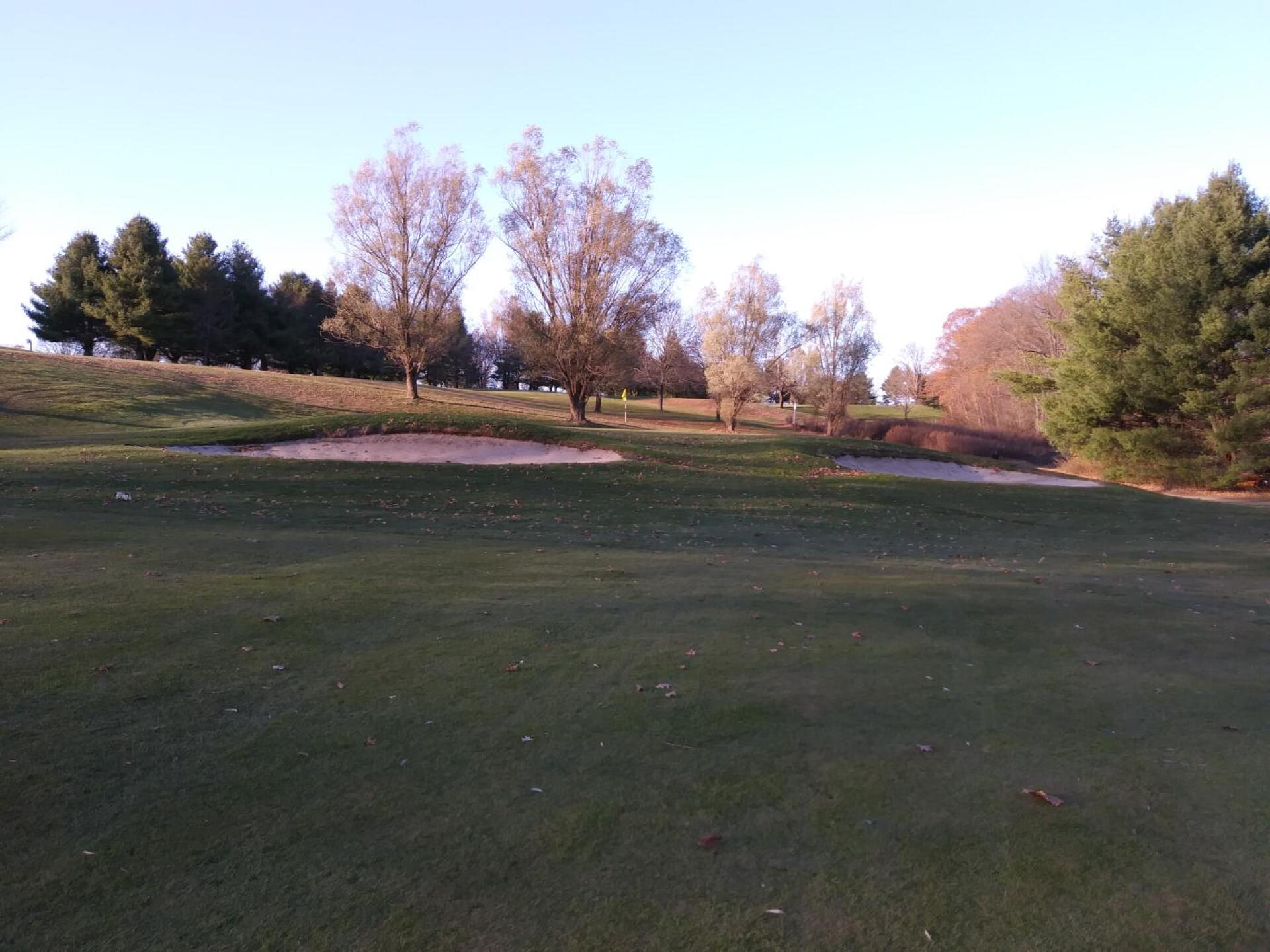 Classic, well--bunkered 12th green (Photo submitted by AptlyLinked on 11/21/2019)