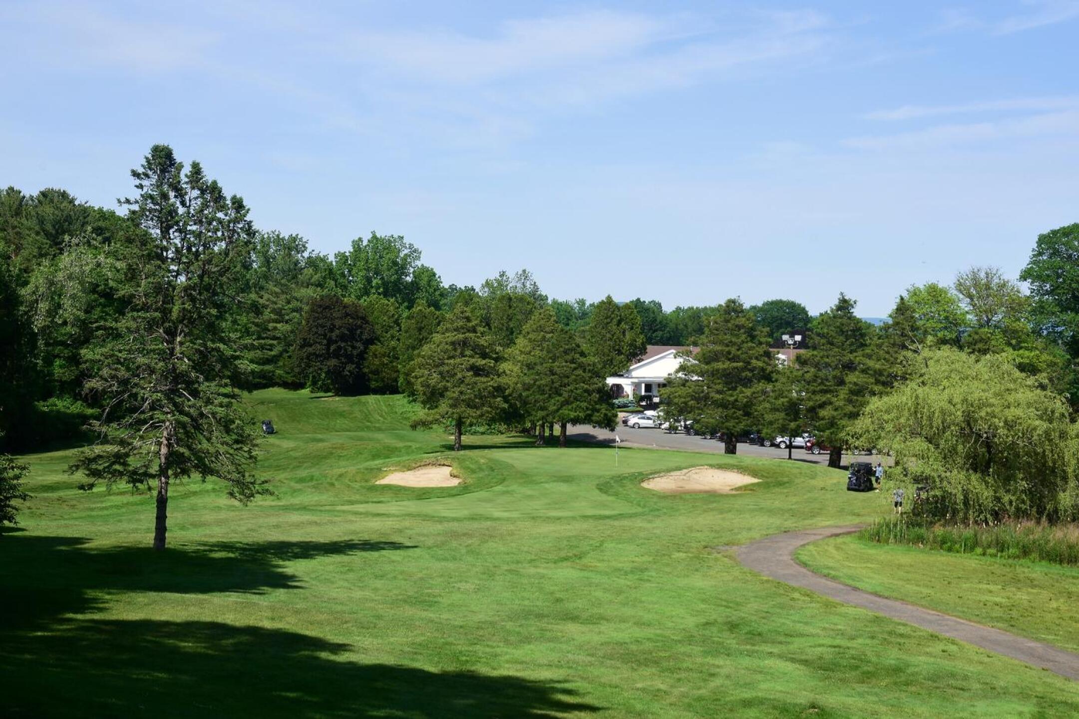18th, par-3, 229: The course closes strongly with a distinctive par-3: its raised, wedge-shaped green is pinched in front by two sizable bunkers. (Photo submitted by AptlyLinked on 06/05/2025)