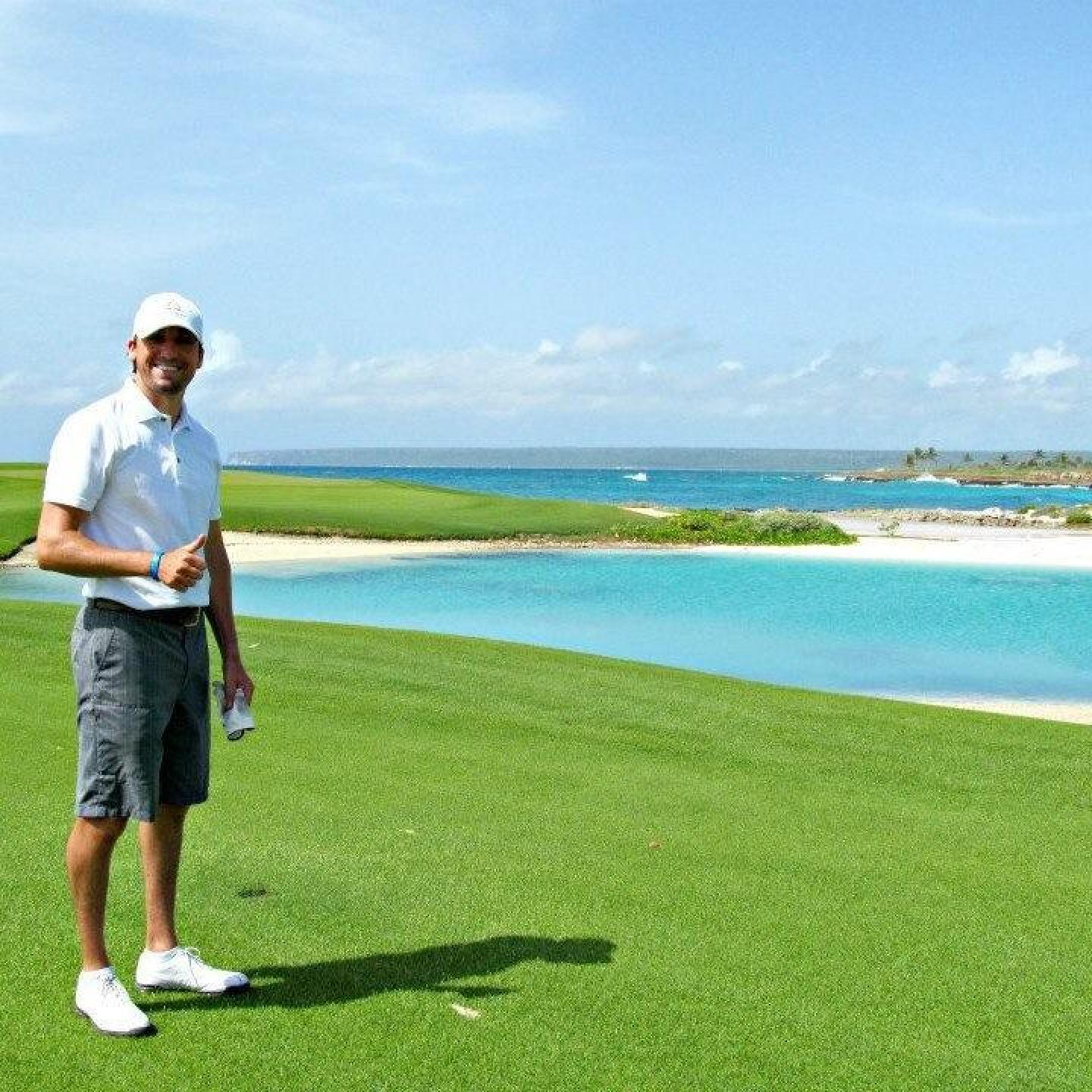 Par 5 2nd hole, lagoon that cuts in by the green (Photo submitted by sacup10 on 04/24/2015)