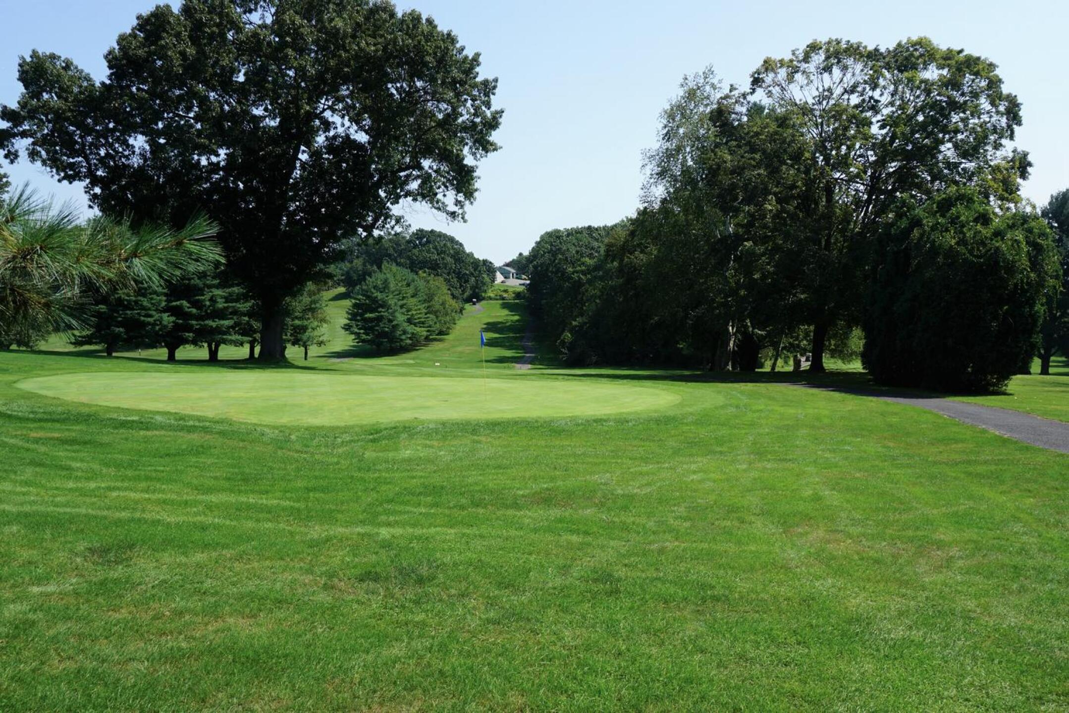 The twelfth, a tight hole, is here seen from behind the putting surface. (Photo submitted by AptlyLinked on 08/29/2021)