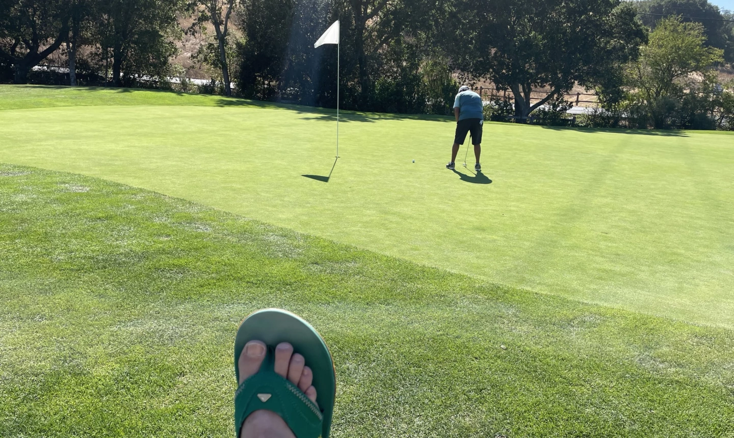 Playing golf in Reef sandals 