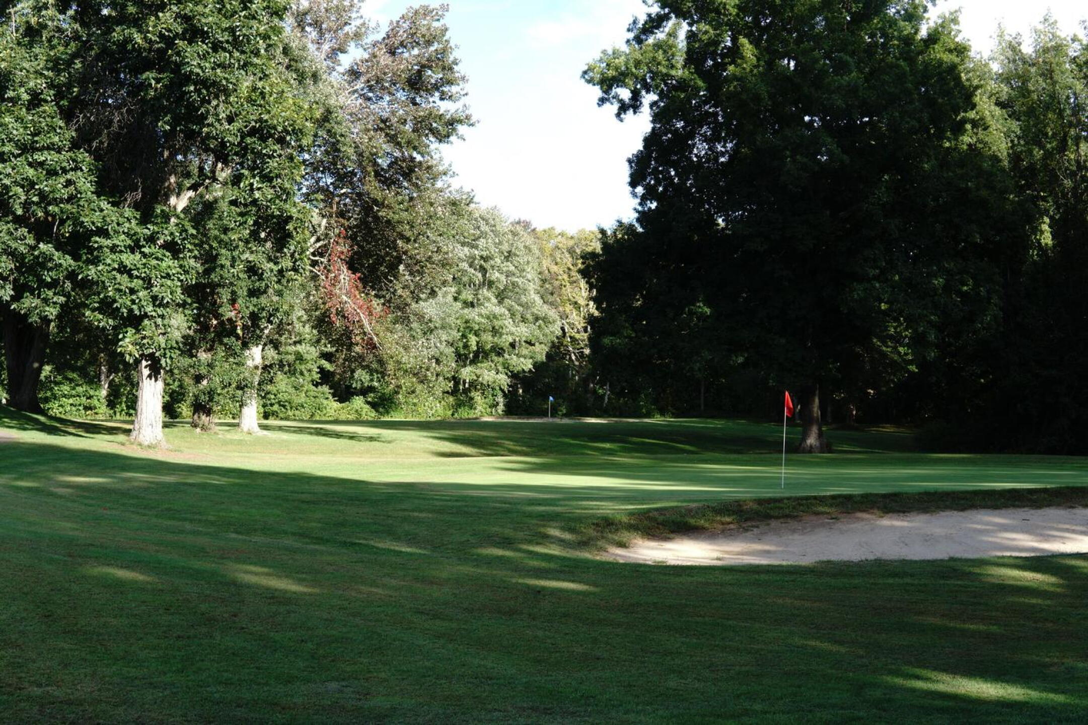 The first green in the late afternoon shadows (green three sits in the background). (Photo submitted by AptlyLinked on 10/02/2022)