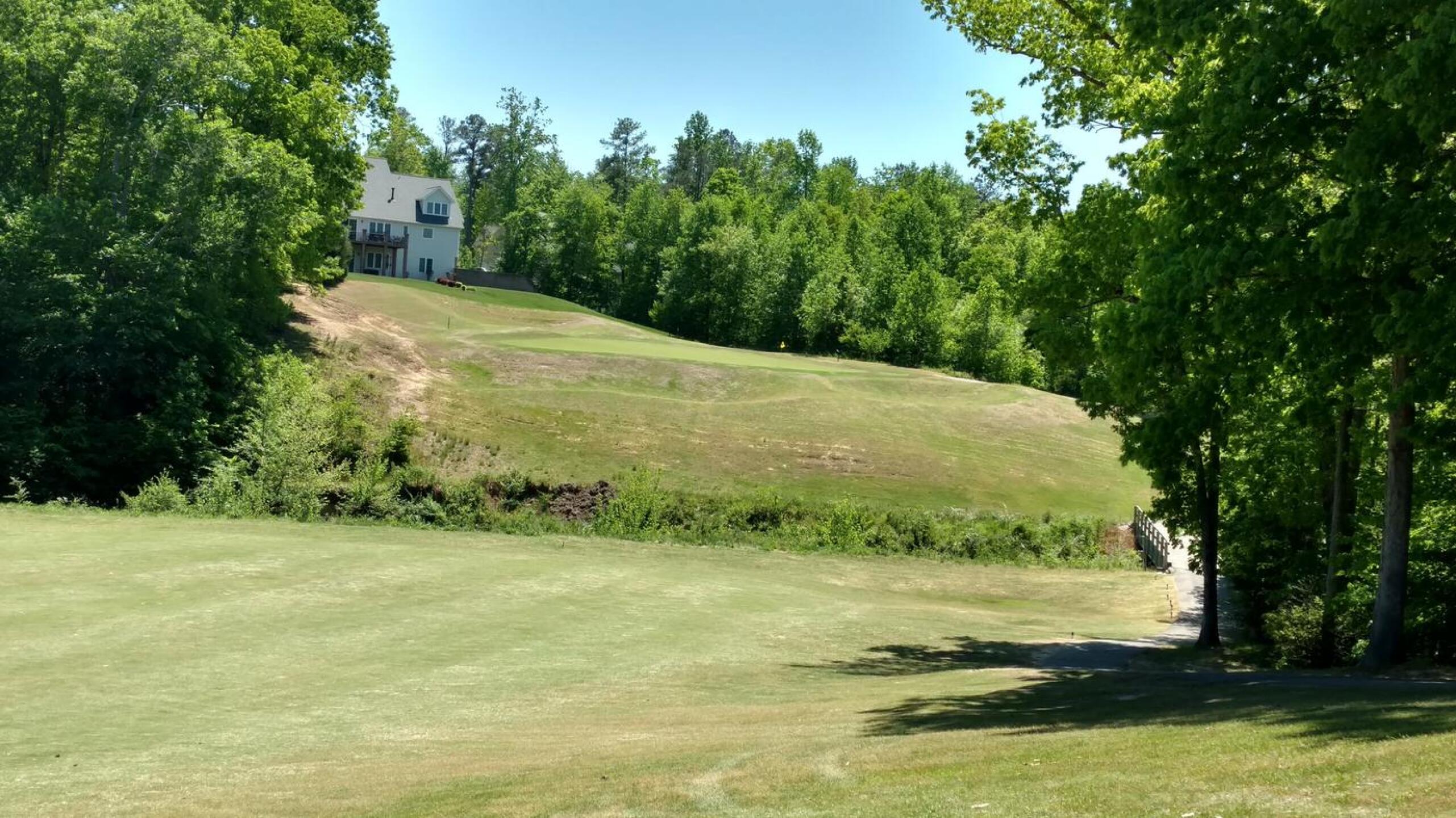 Par 4, #4 from middle fairway looking to the elevated green. (Photo submitted by Bombtech6316 on 05/13/2018)
