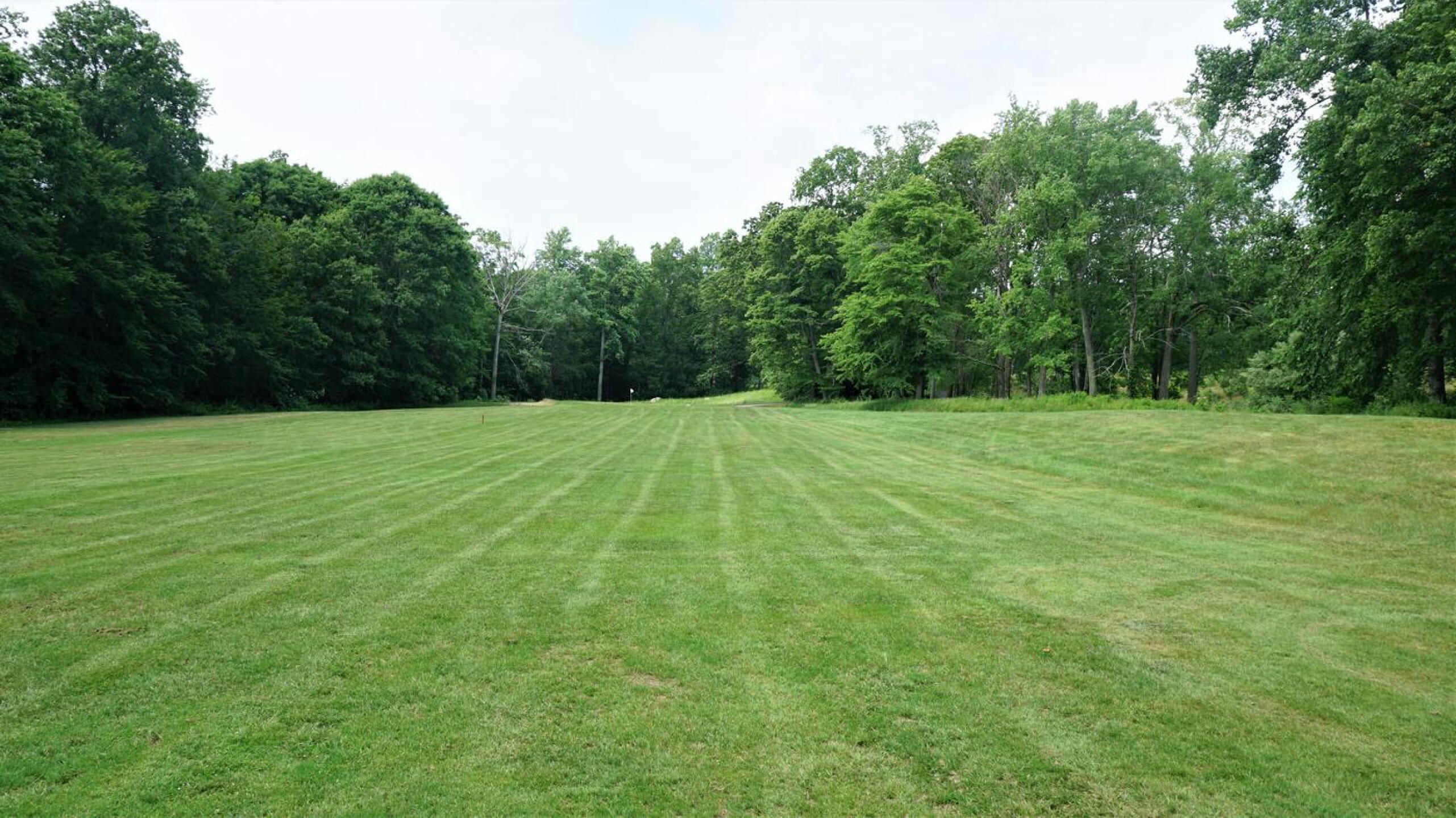 Twelve. A 377-yard four-par that plays longer, moving uphill on the approach, seen here. (Photo submitted by AptlyLinked on 06/09/2021)