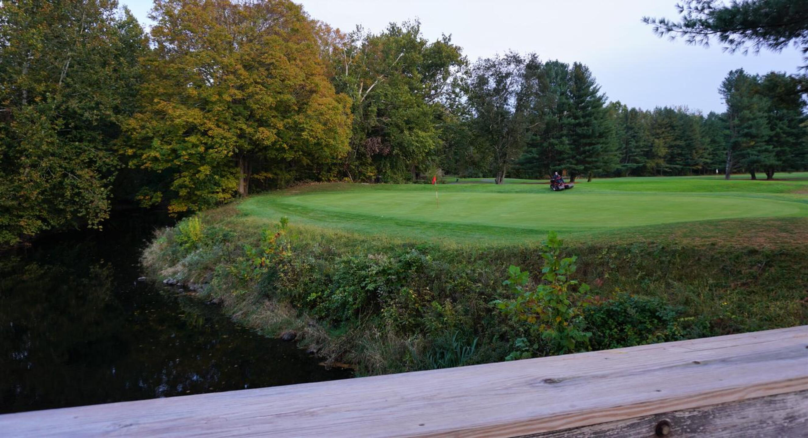 At dusk, a greenskeeper prepares green nine for tomorrow. (Photo submitted by AptlyLinked on 10/12/2020)