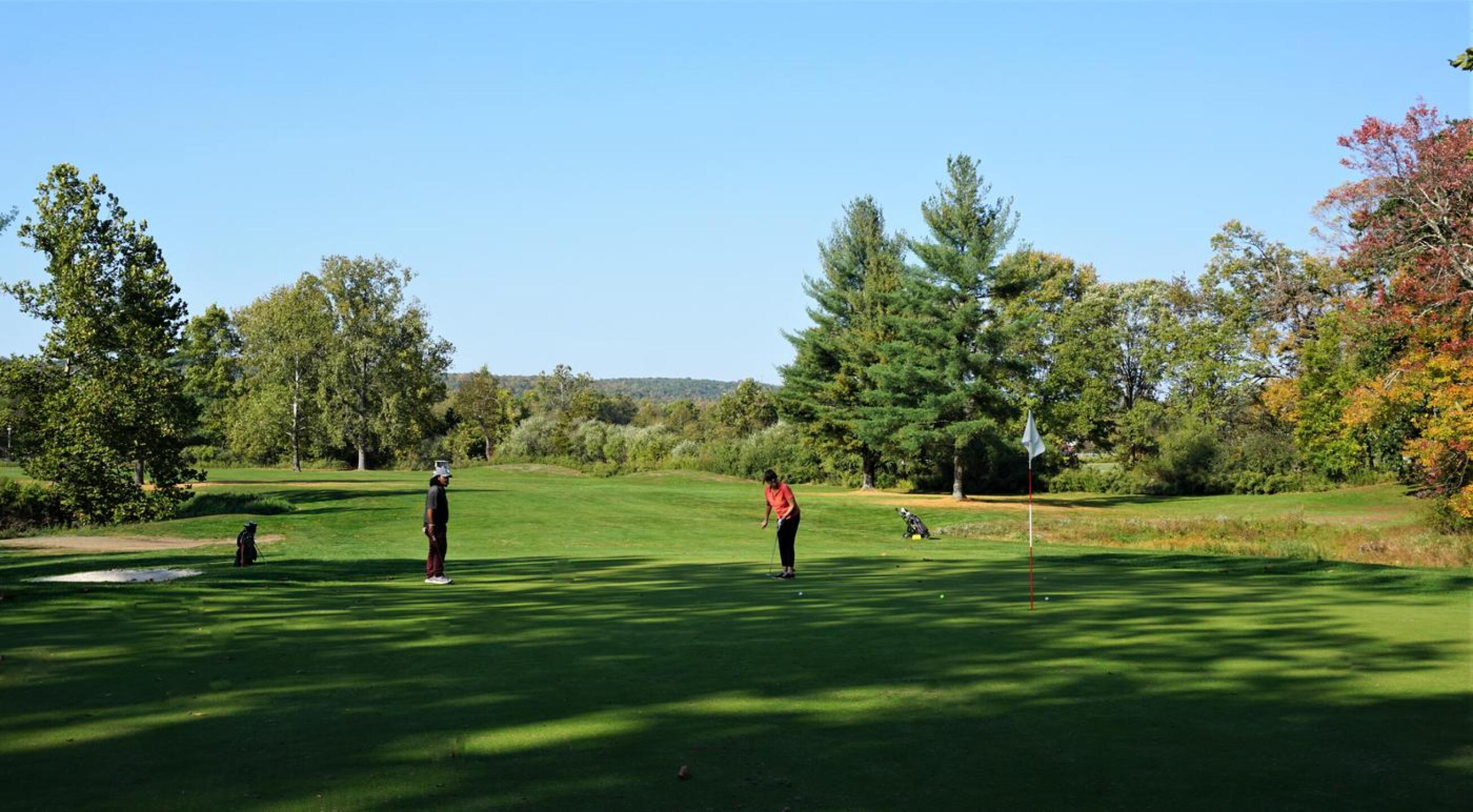 The seventh: Sharon, one of our playing partners from Southbury, urges her yellow golf ball toward the hole (it finished within a foot). (Photo submitted by AptlyLinked on 10/12/2020)