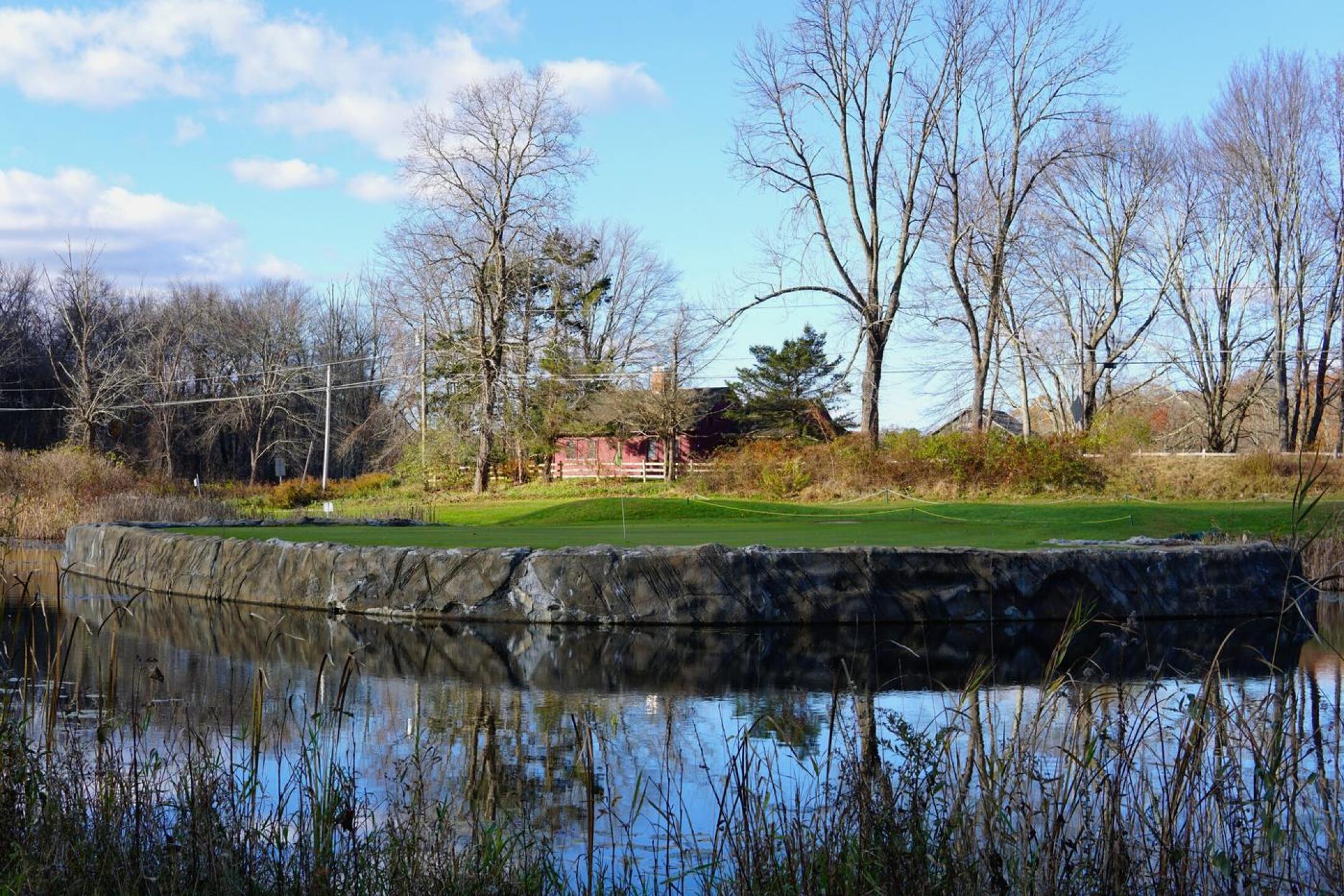 Around most of the ninth green is a pond, which takes its share of golf balls. (Photo submitted by AptlyLinked on 11/17/2023)