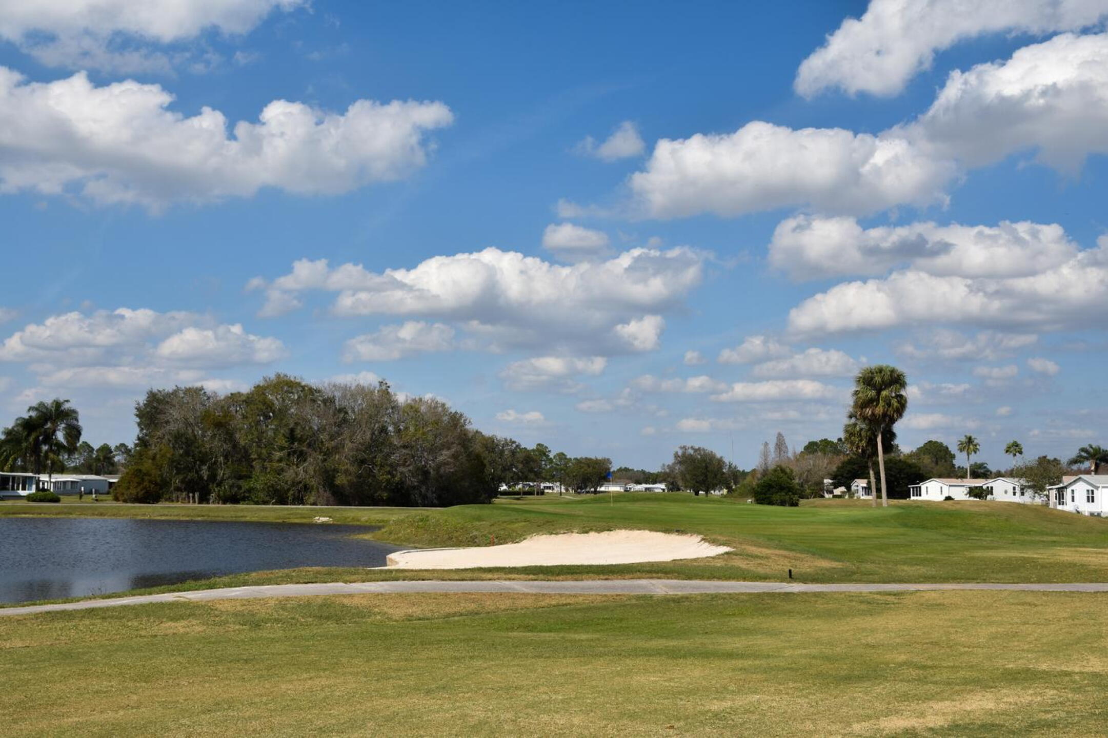 Running as long as 400 yards, the 10th threatens not only with a daunting array of hazards—water, sand, trees, OOB–but also a tight fairway. (Photo submitted by AptlyLinked on 02/18/2025)