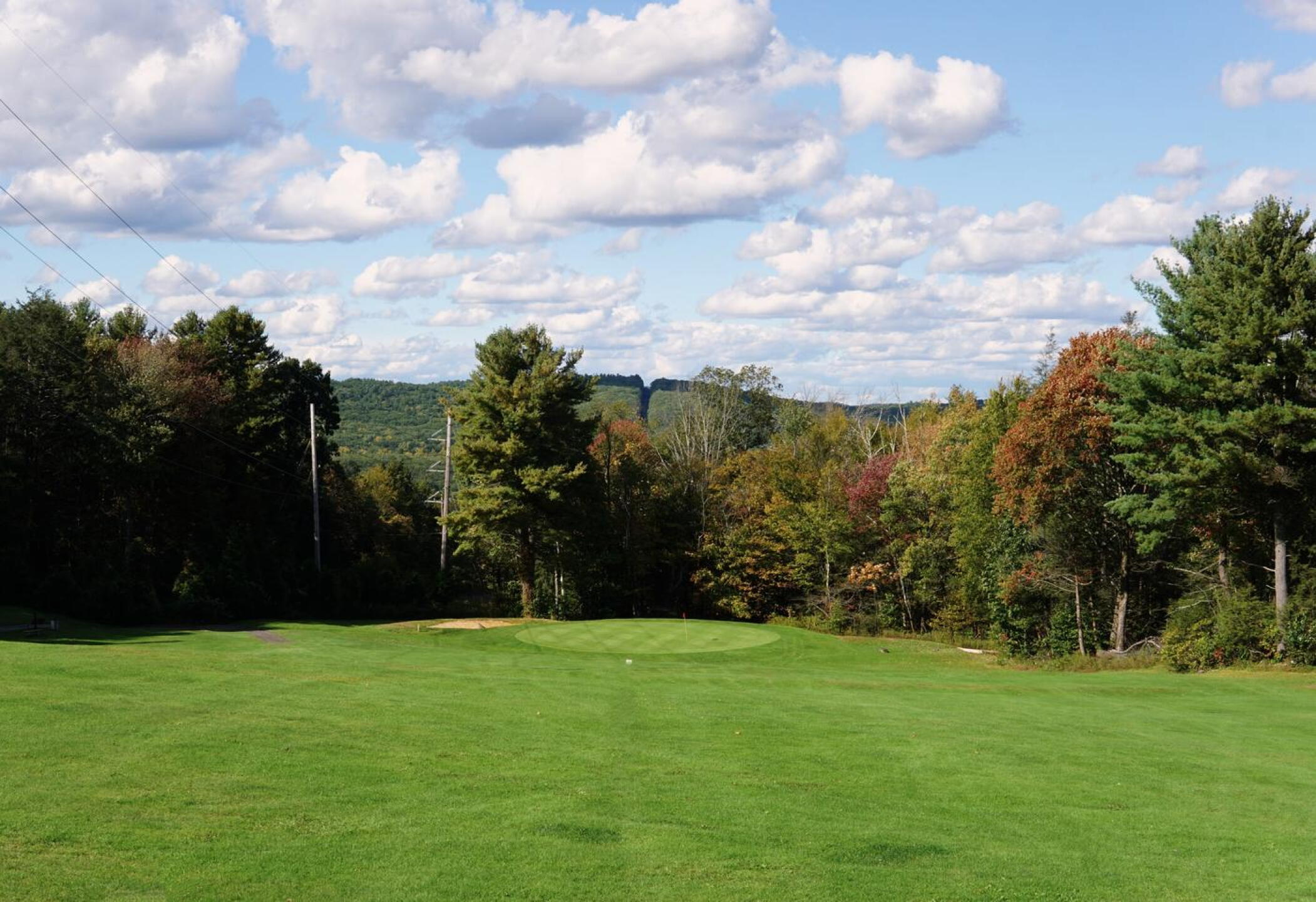 The par-4 third plays over a hill on the blind drive, then it’s a downhill pitch to this green. (Photo submitted by AptlyLinked on 10/16/2023)