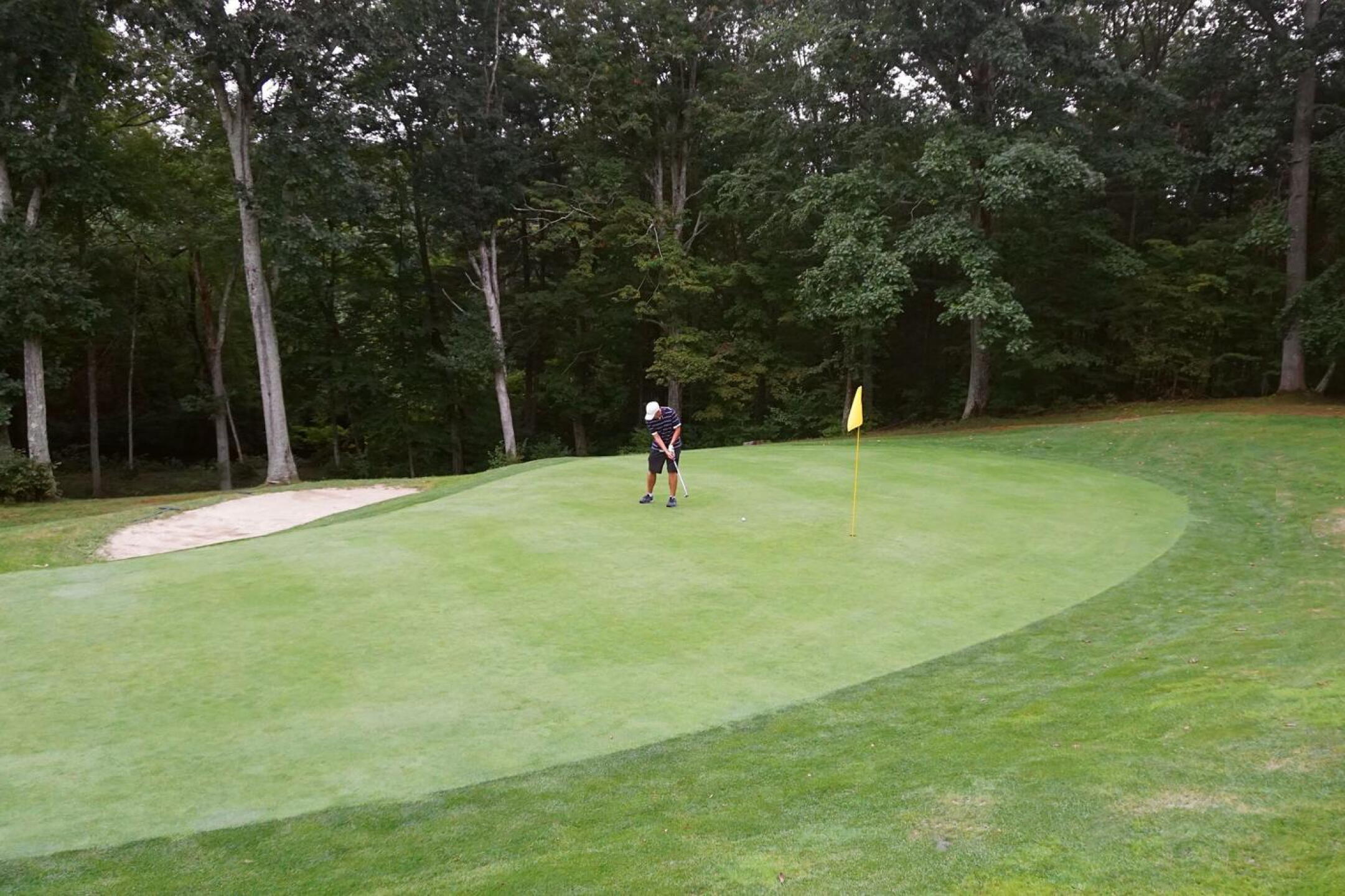 .17: My playing partner Tim strokes his putt toward the hole on this demanding par-3. (Photo submitted by AptlyLinked on 09/03/2021)