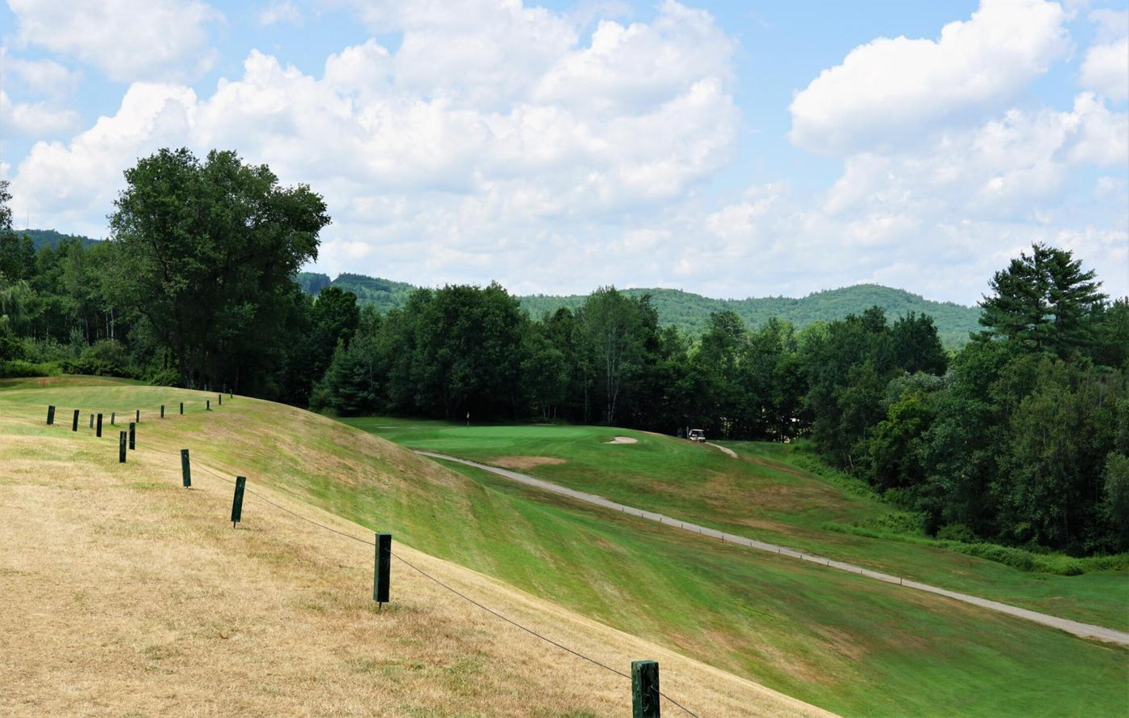 6th: Par-5, 450. Short but lethal, the sixth has a fairway that plunges–if you overshoot it–straight down a huge falloff. (Photo submitted by AptlyLinked on 07/21/2022)