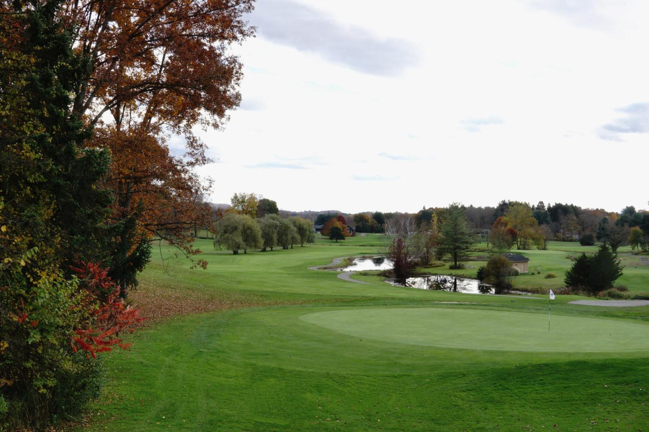 The course looks serene in the late afternoon of an autumn day; this from behind green ten. (Photo submitted by AptlyLinked on 11/06/2023)
