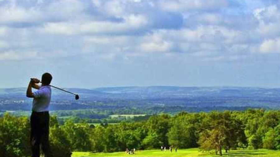 Golfer teeing at Crowborough Beacon