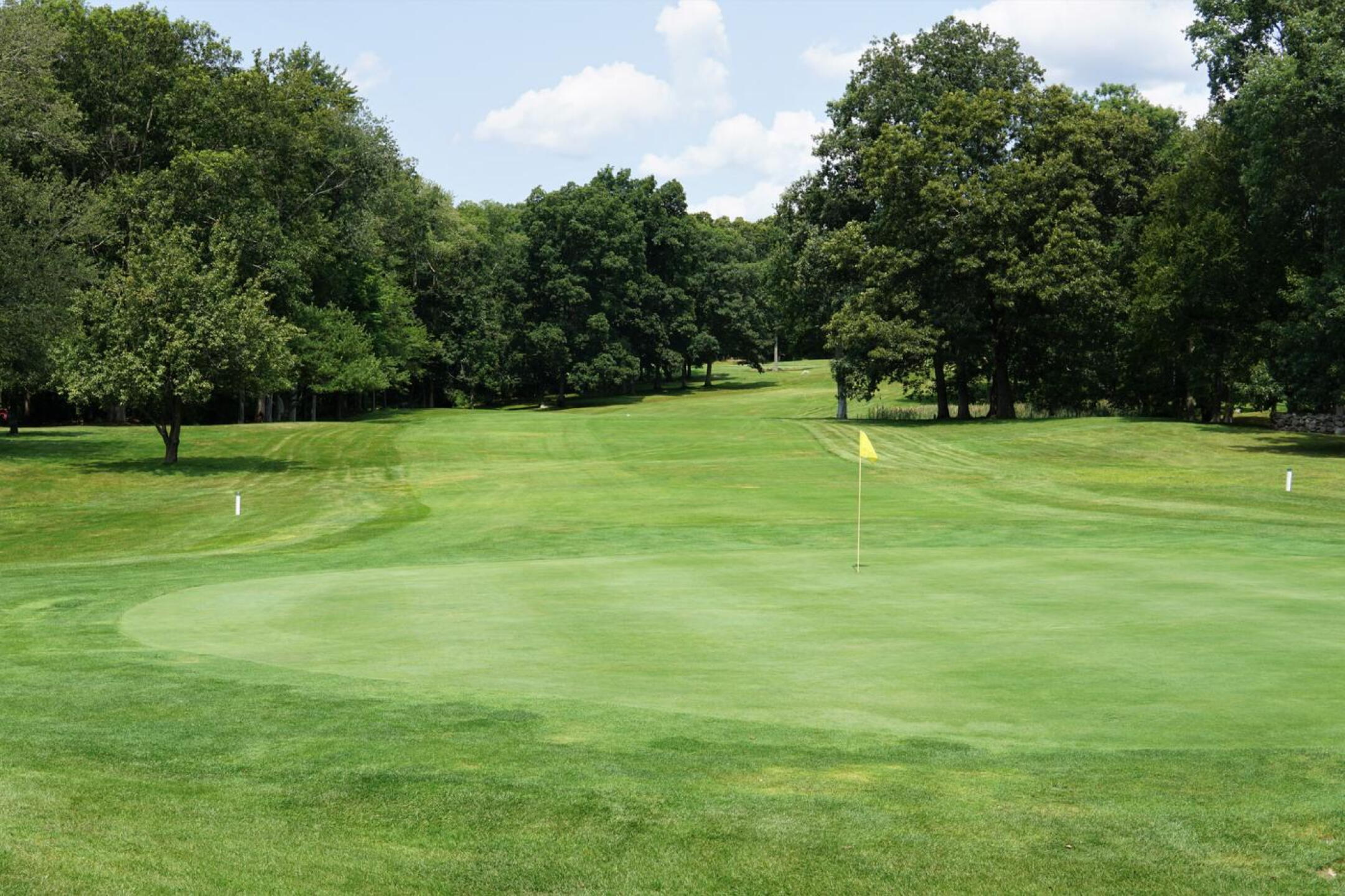 Twelve, a par-4 whose fairway doglegs left on its way to the green, is a fine golf hole of moderate difficulty. (Photo submitted by AptlyLinked on 08/03/2023)