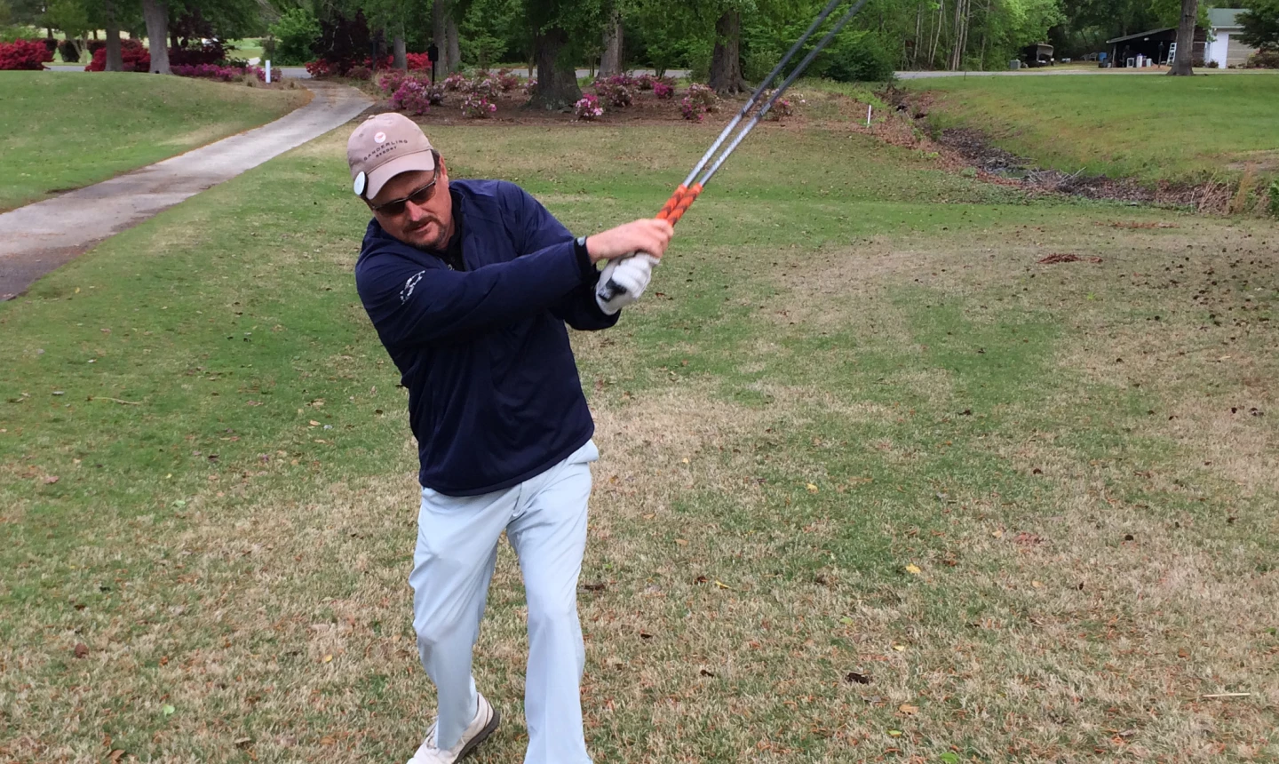 Swinging two clubs