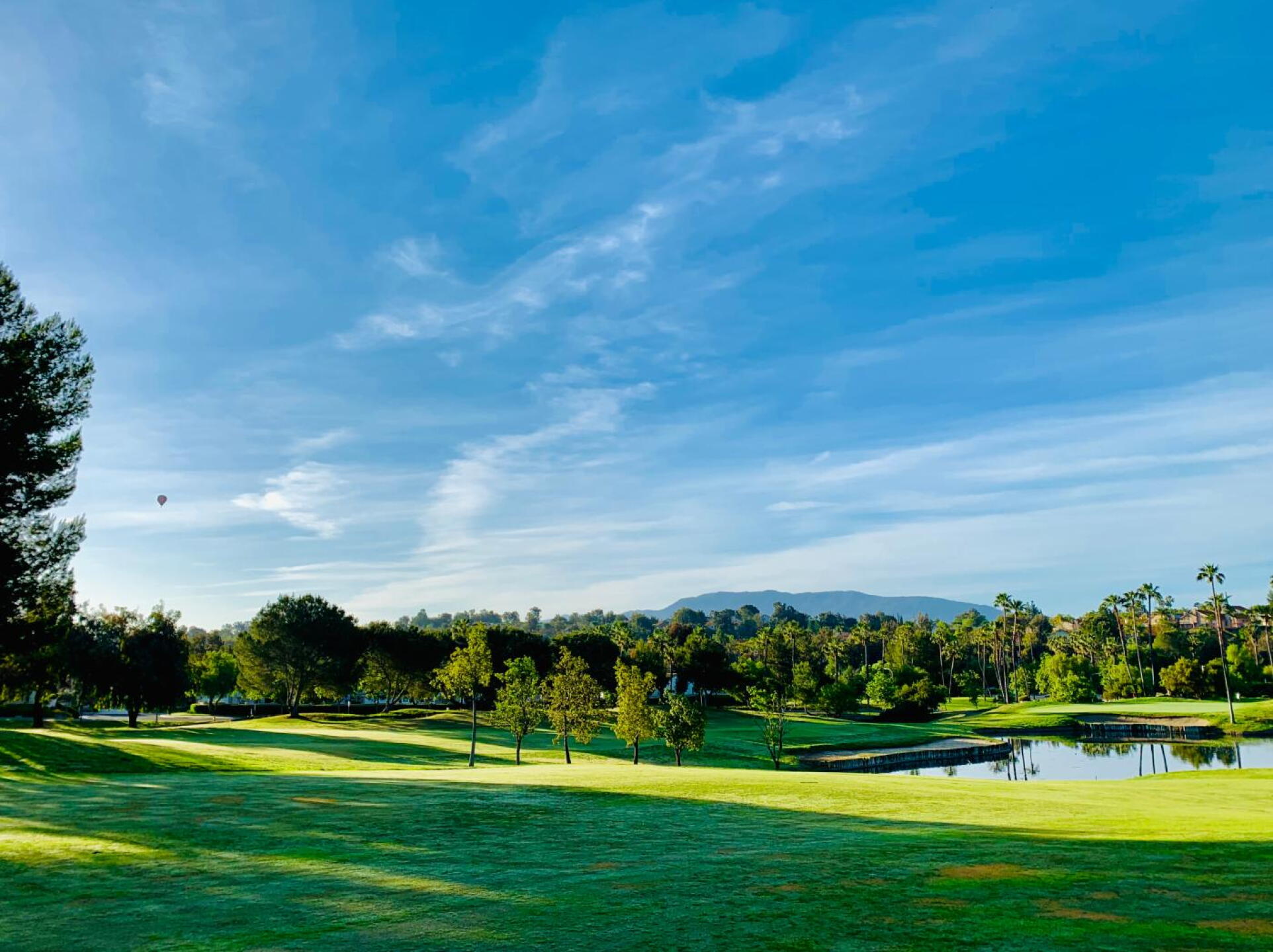 Looking back on 10th green with Hot Air Balloons in distance (Photo submitted by AgentBaldEagle on 05/18/2019)