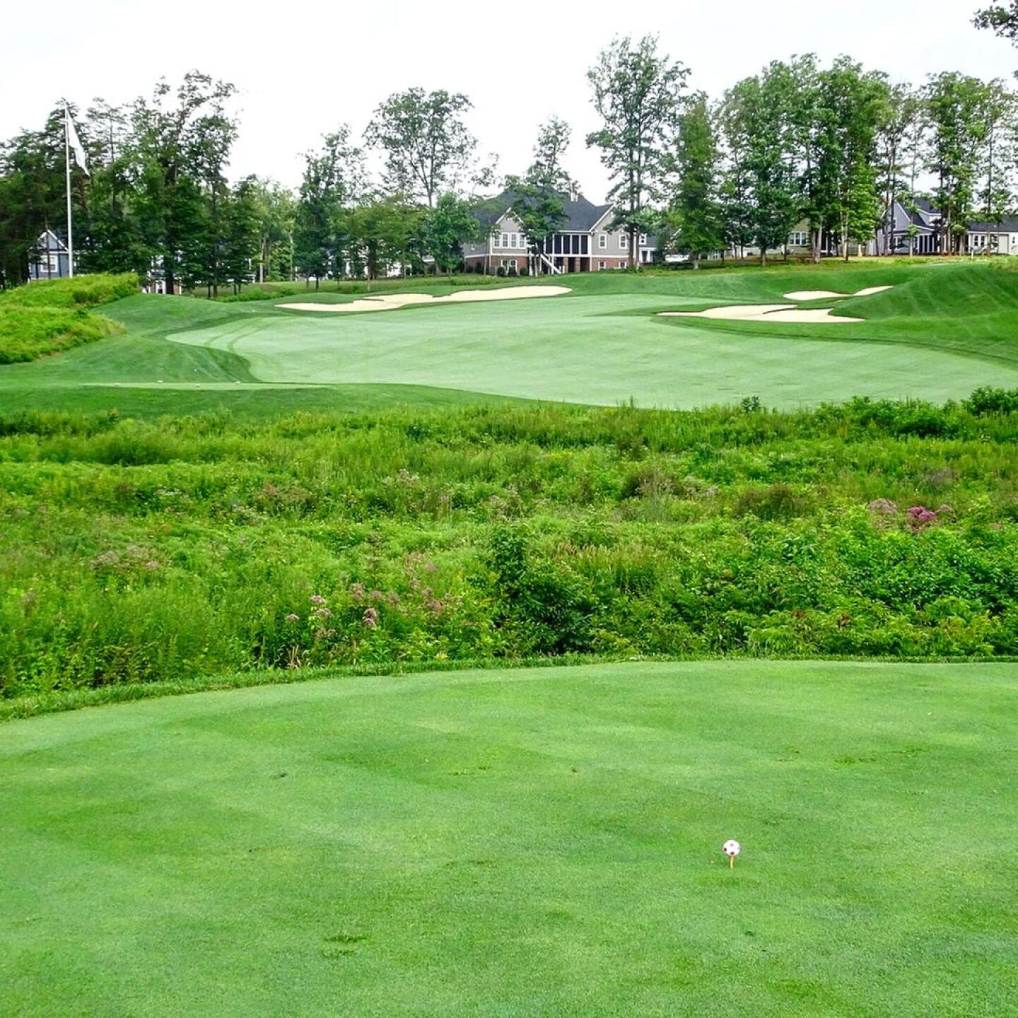 The par-4 10th is an iconic dogleg right and usually has an insanely tough pin location. (Photo submitted by Back9Ben on 08/05/2018)