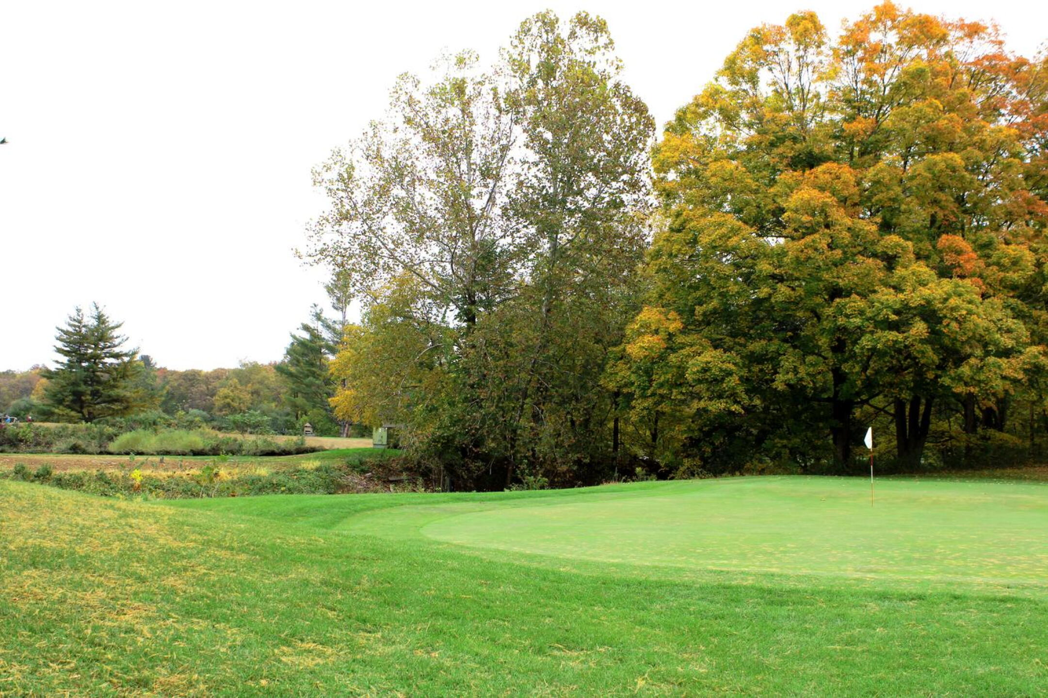 The final green: On the approach, your golf ball will take a bath in the Pomperaug River if you’re short. (Photo submitted by AptlyLinked on 10/19/2024)