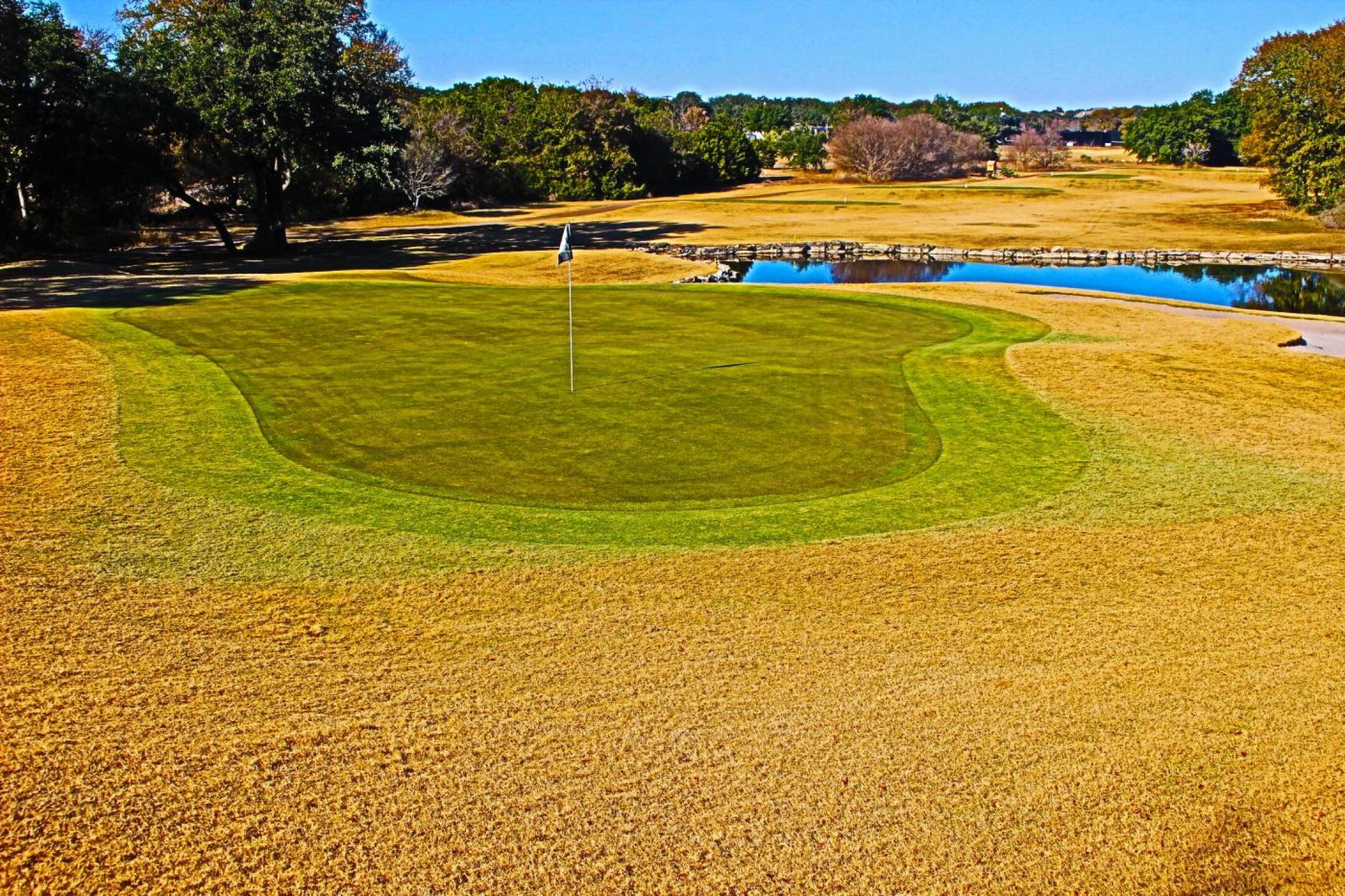 Green surrounded by water and bunkers # 13 (Photo submitted by Golfpro1221 on 11/21/2019)