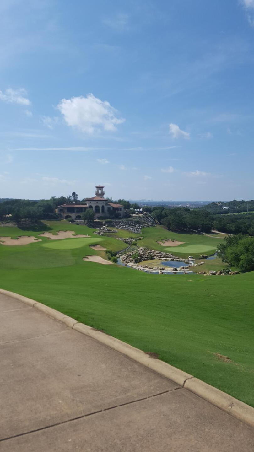Clubhouse with greens of 9 and 18. (Photo submitted by TheOBchef on 07/01/2018)