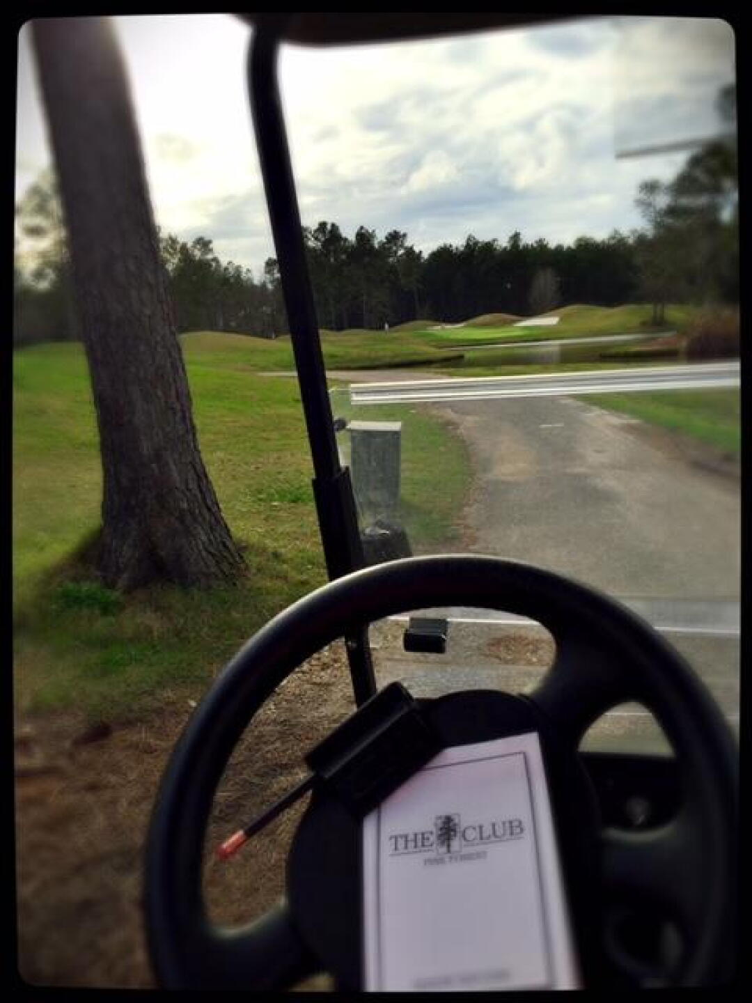 short par 3 on the back 9 with lots of water and undulating hills surrounding the green (Photo submitted by zuschlagzd on 12/30/2015)