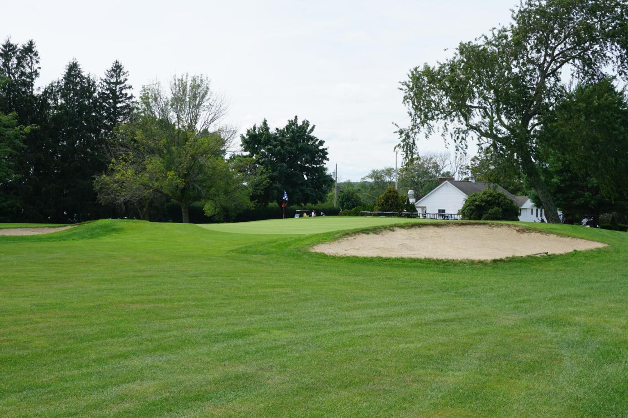 Closing hole, Blue: A classic par-4, finishing on this bunkered green, seen from right flank. (Photo submitted by AptlyLinked on 08/19/2021)