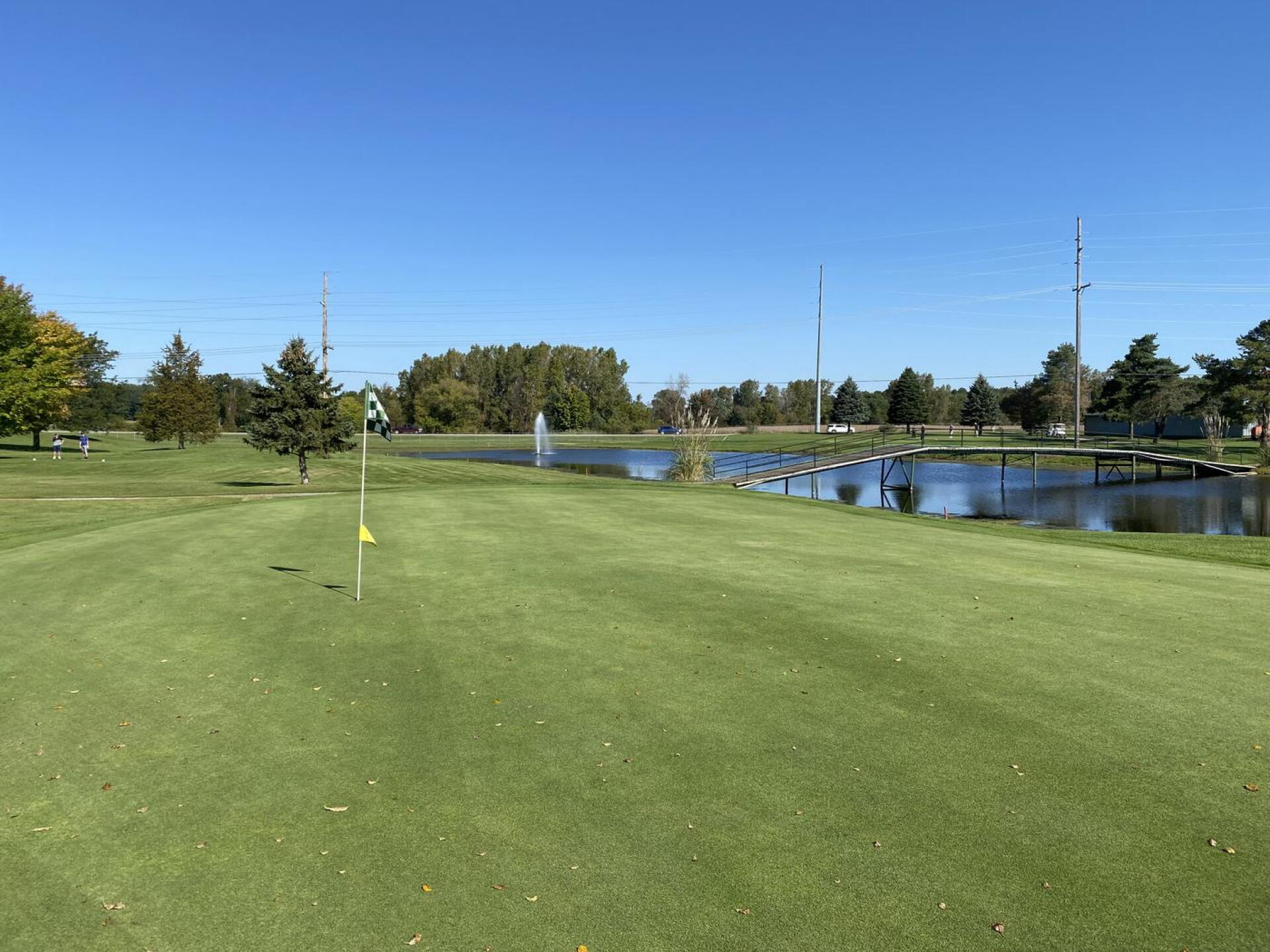 The 15th green here is one of the more picturesque on the course. Another slightly crowned green than notches itself behind a front left bunker. whatever you do, don't go in that bunker as there is water straight behind the green. (Photo submitted by BuffaloBen15 on 01/04/2022)