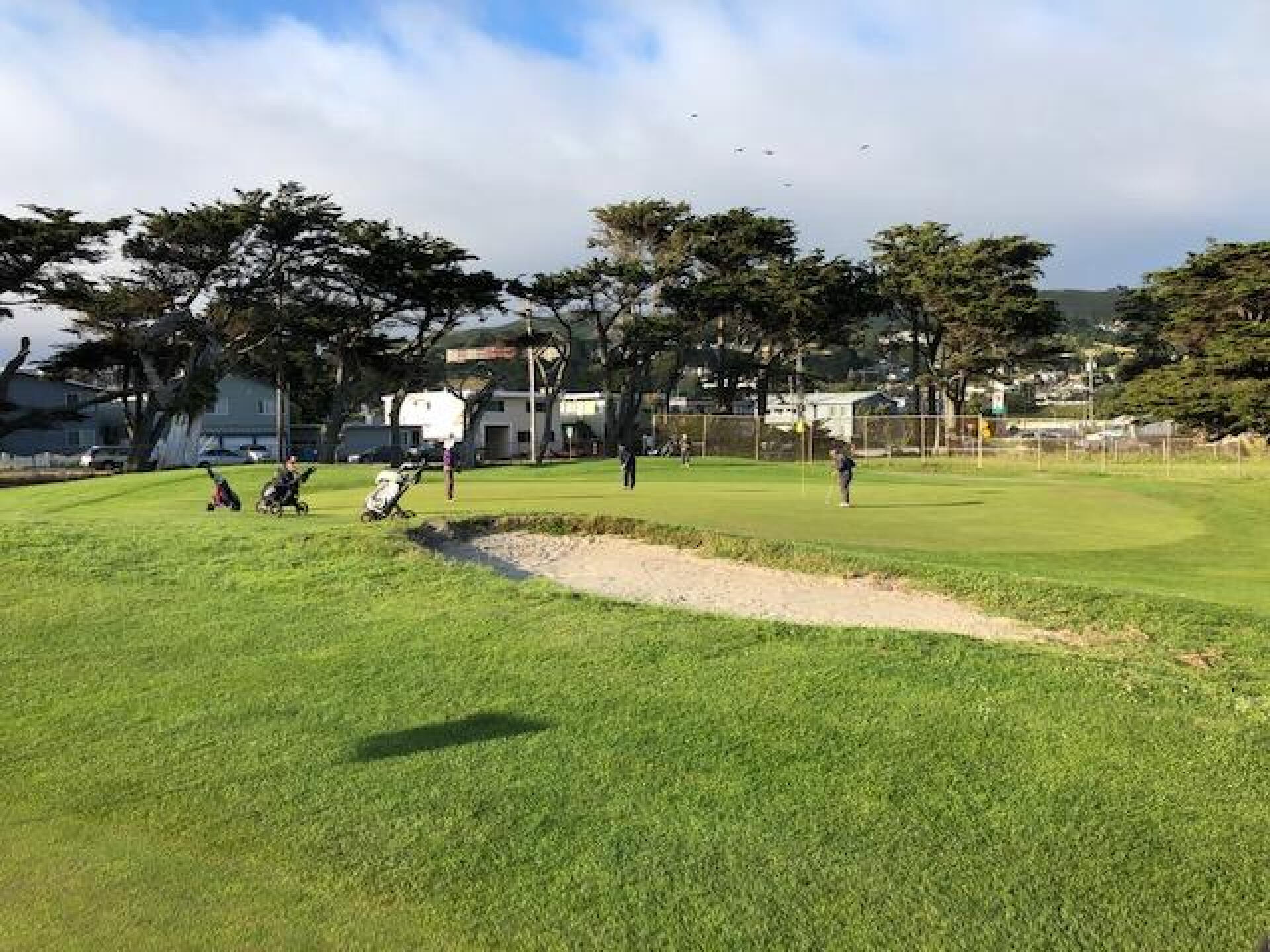 A foursome having fun on the 15th green (Photo submitted by Gremlingolfer on 06/03/2019)