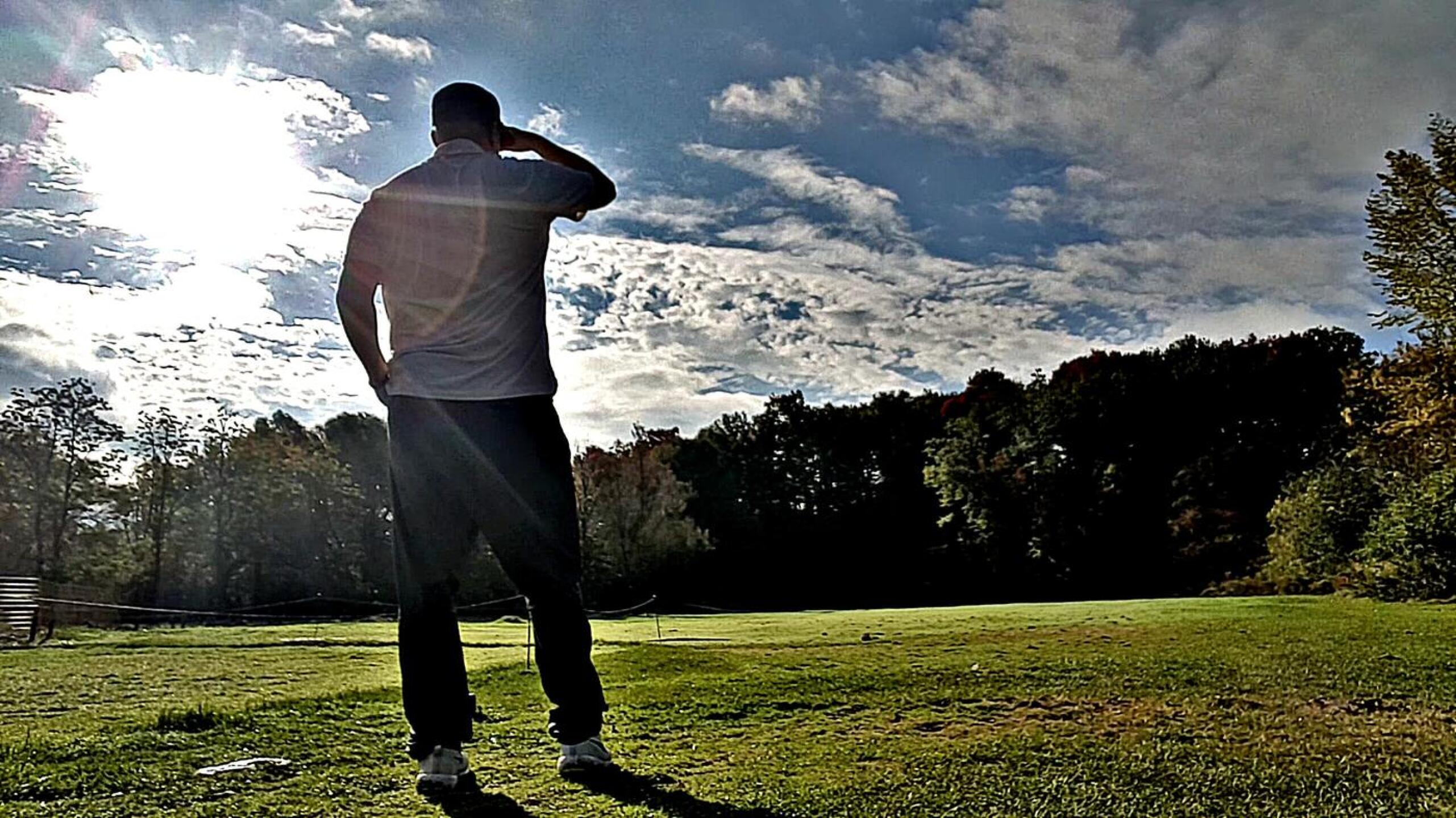 trying to figure out where my ball went with the sun reflecting off the flooded fairway....it was submerged. (Photo submitted by B1GR3K on 09/29/2020)