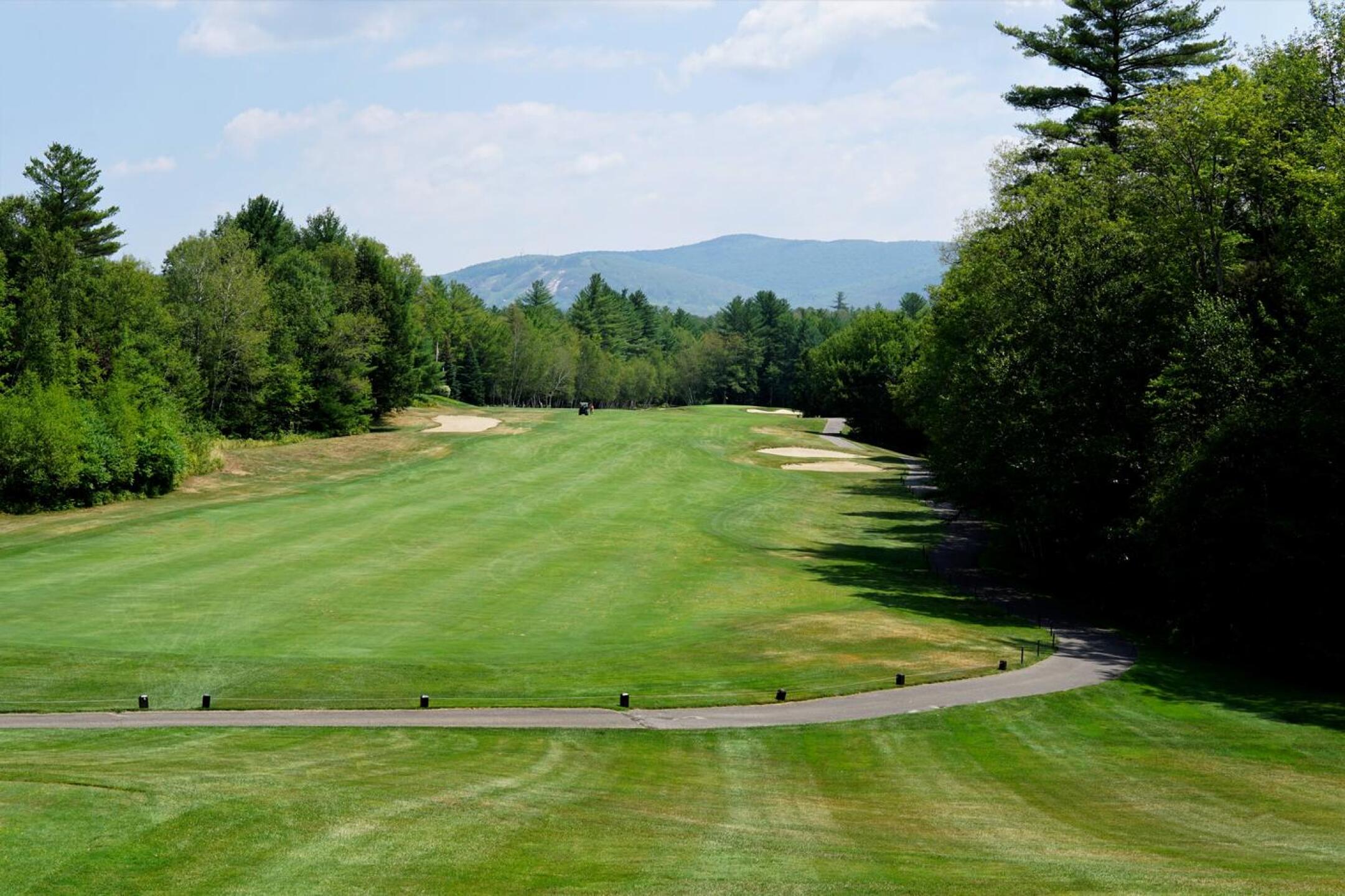 A pleasant view from tee five, stretching to Mount Cranmore (elevation: 1,680 feet). Excellent strategic golf hole. (Photo submitted by AptlyLinked on 07/24/2022)