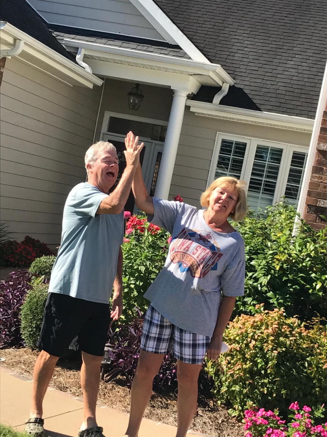 John and Donna feeling sad as my wife and I pull out of their driveway after sponging off of them for a week... (Photo submitted by LarryNoli on 08/03/2017)