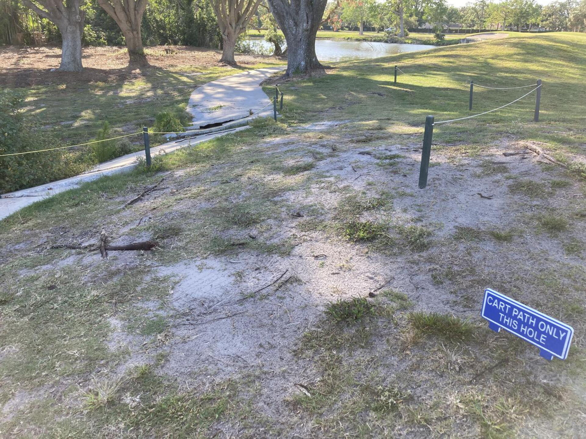 Busted up cart path on hole 16 (Photo submitted by jerrytarasek on 04/16/2023)
