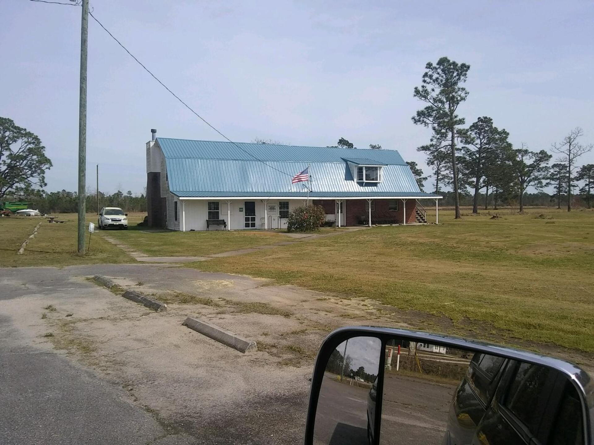 Club House from Airport Rd. heading East. (Photo submitted by udVgxjMxFxDURYzyg1x5 on 03/20/2022)