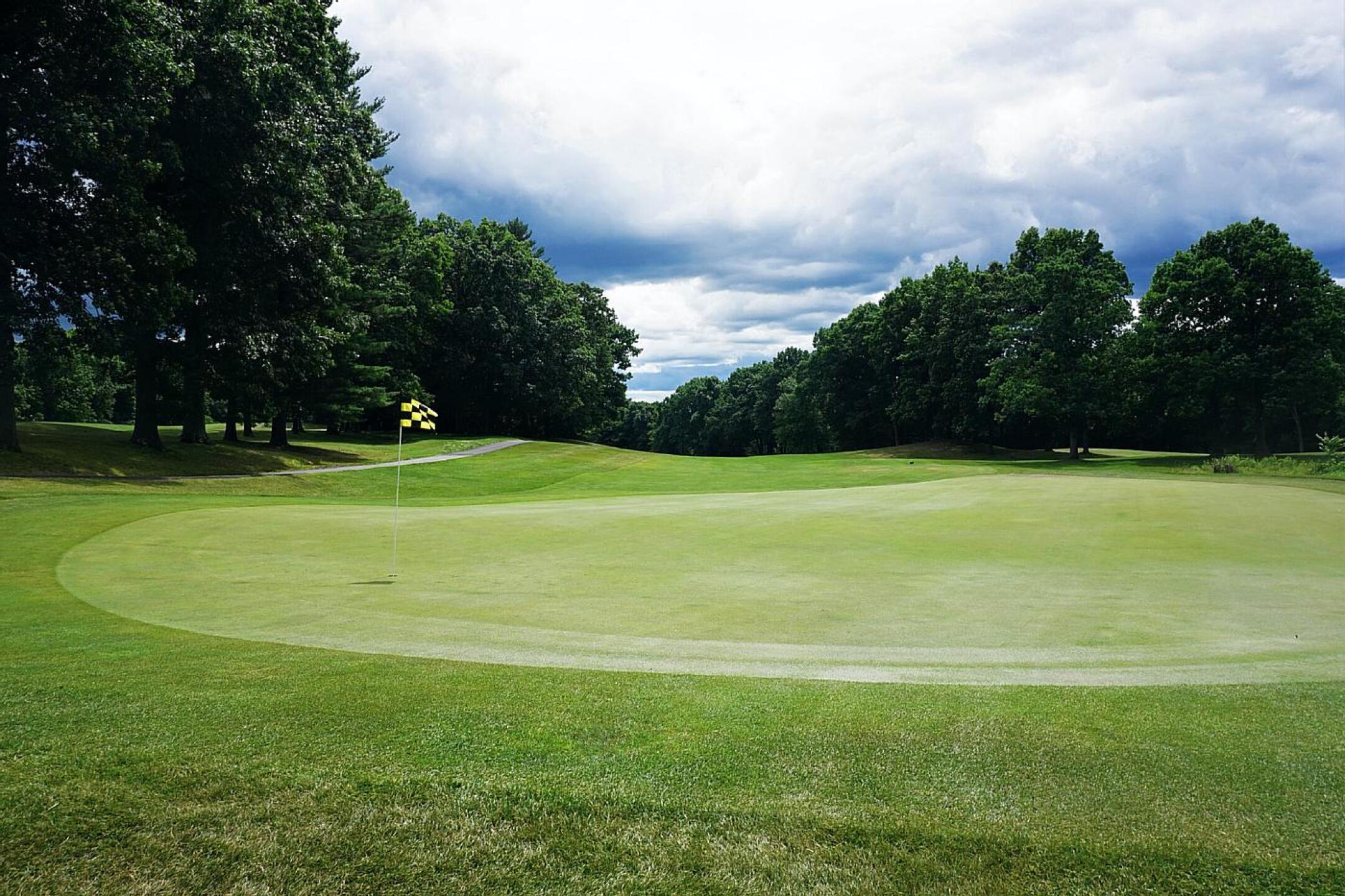 Fourteen, maybe the back nine’s toughest hole, plays uphill to the green. Par-4, 401. (Photo submitted by AptlyLinked on 07/08/2022)
