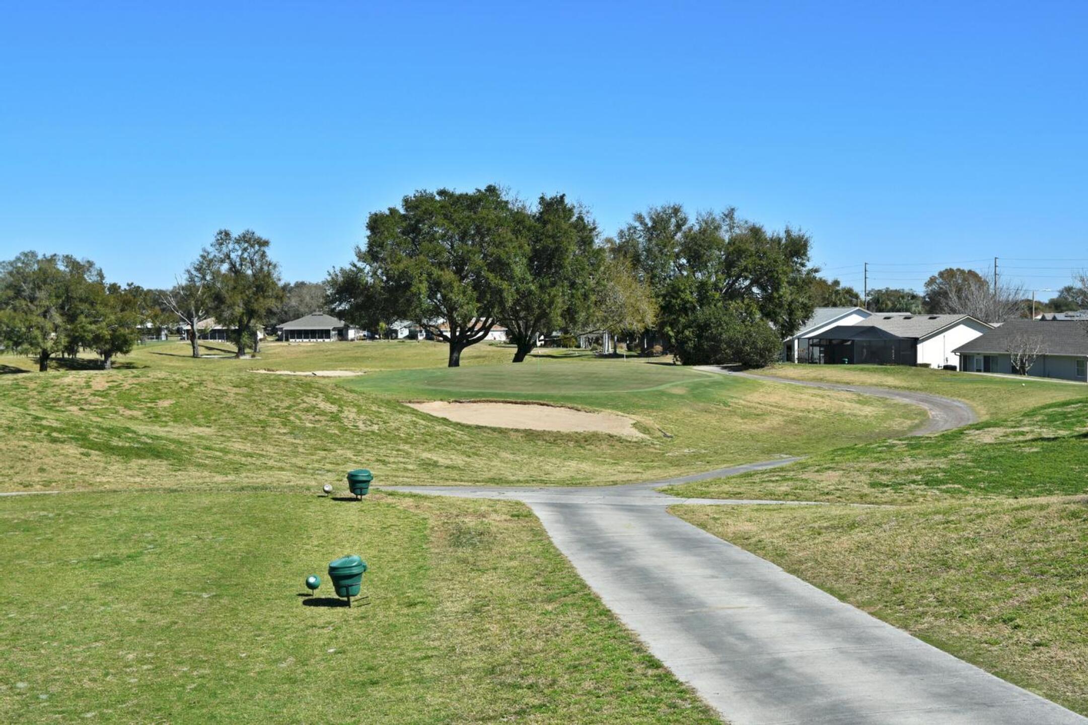 Sixth hole, par-3, 136 yards: The downhill tee shot plummets to a long and large, double-bunkered green that is wider in the back. (Photo submitted by AptlyLinked on 02/26/2026)