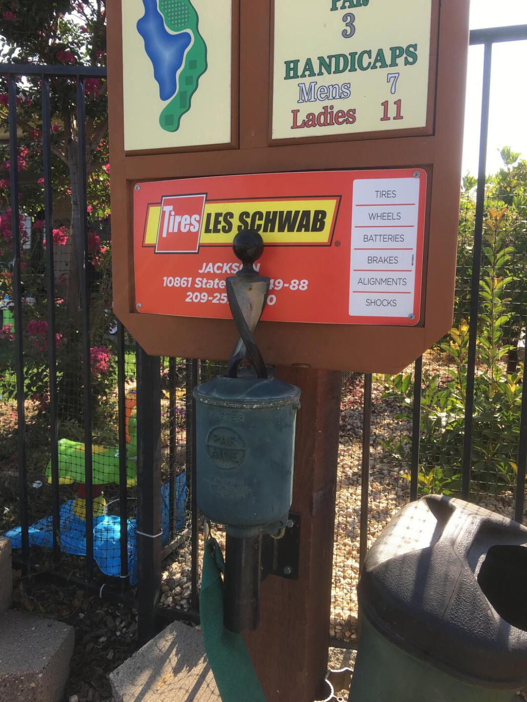 A little deferred maintenance, the sign got hot and buckled so you can't use the ball washer (Photo submitted by Cops1998 on 07/28/2018)