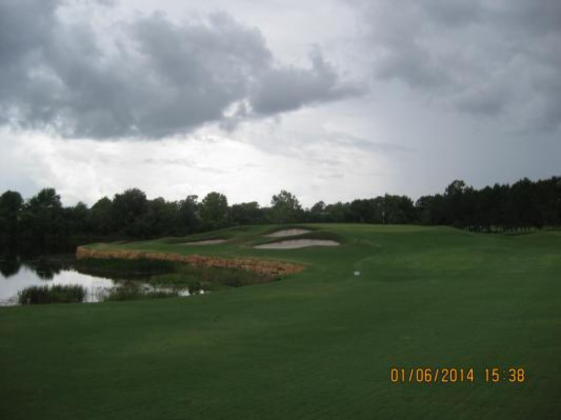 Grande Pines #10 Elevated Green with protective bunkers and beautiful rock wall. (Photo submitted by Steve8905914 on 06/01/2014)