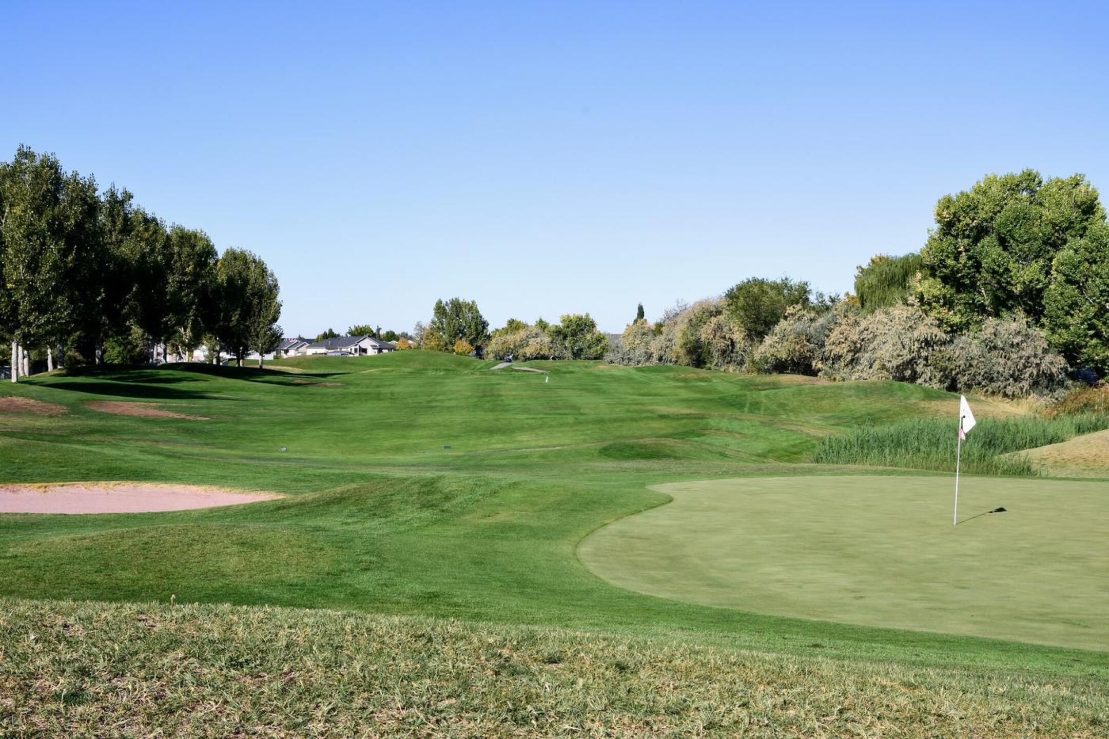 The green at hole fourteen slopes from back to front. The real challenge, however, will unlikely be the putting, because two solid and accurate strikes are necessary for a GIR. (Photo submitted by AptlyLinked on 10/07/2025)