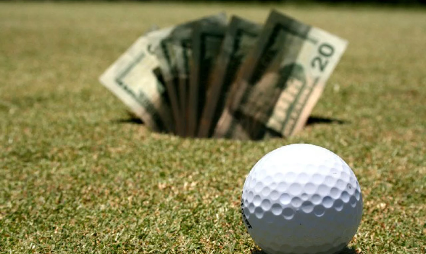 Golf ball and cash