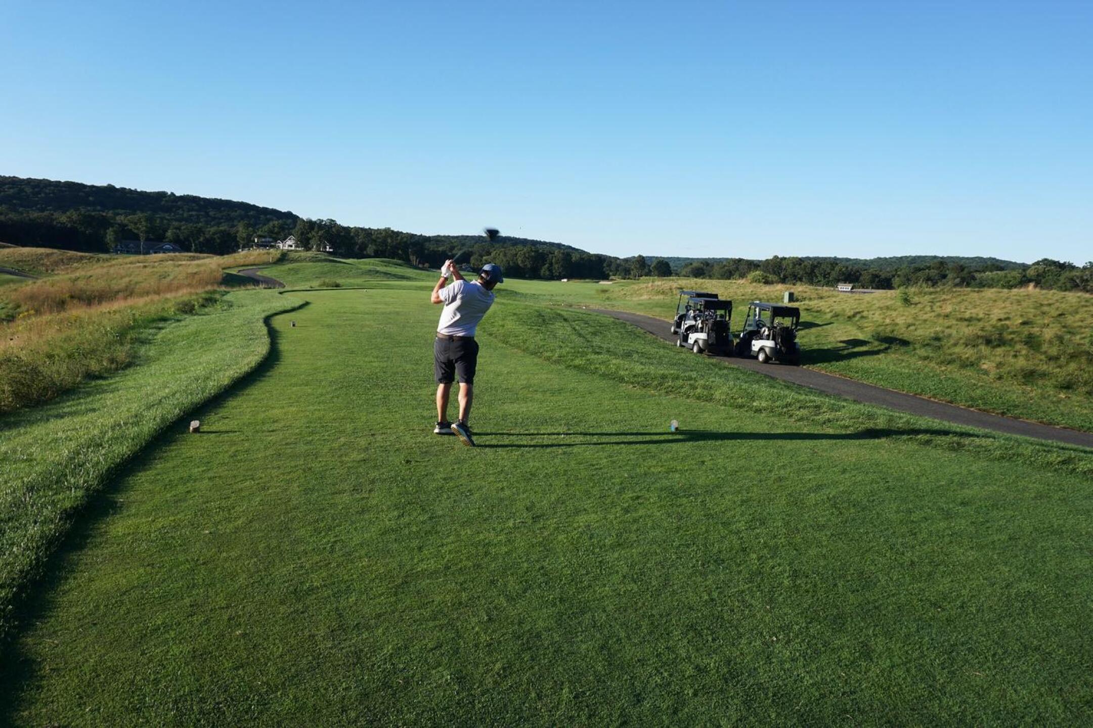 Eighteen, par-5, 551. My playing partner rips a drive up the fairway. This robust finisher will put your skill to the test. (Photo submitted by AptlyLinked on 09/21/2021)